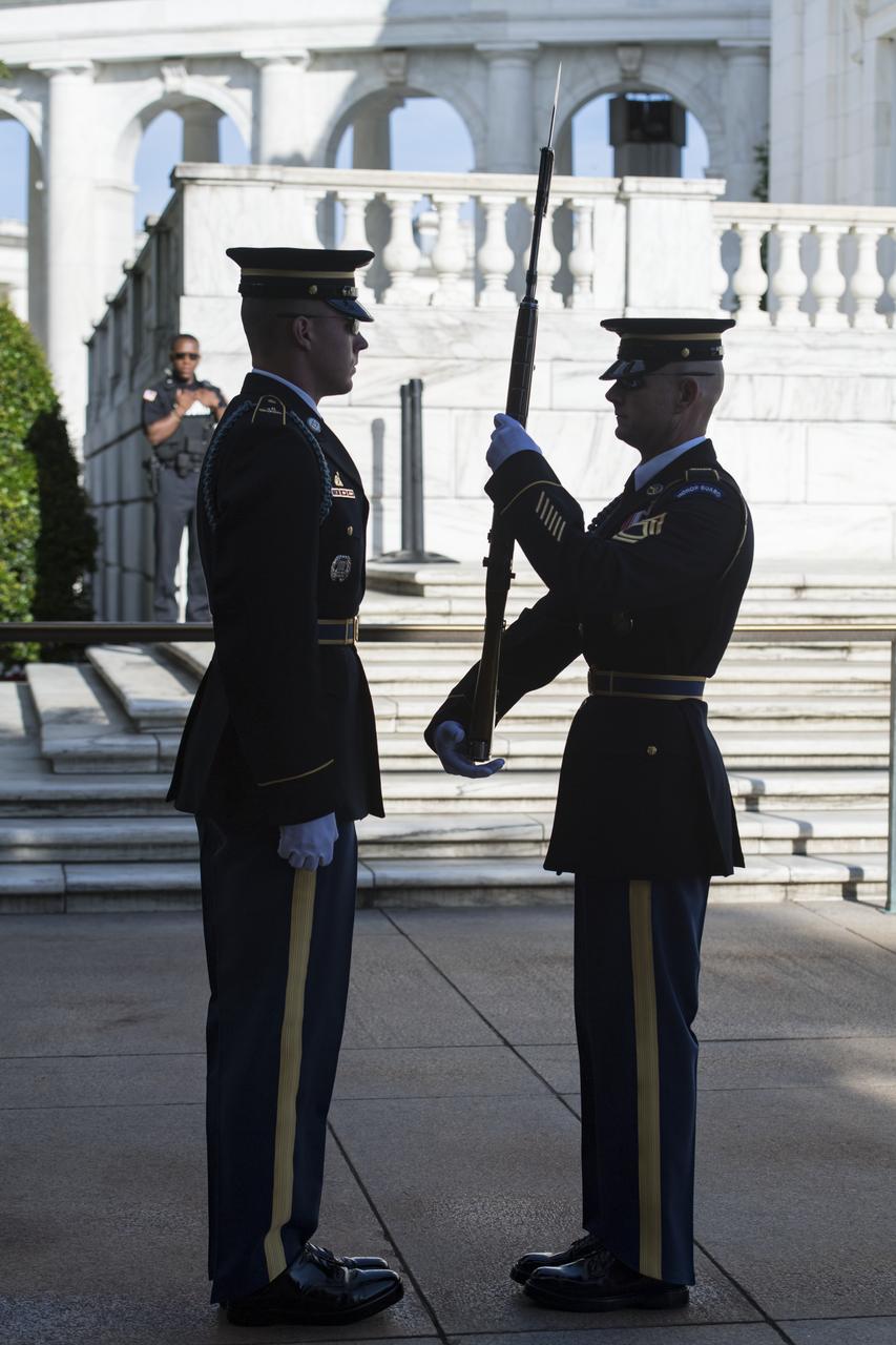 NASA astronauts Mark Vande Hei and Joe Acaba attend the changing of the guards at the Tomb of the Unknown soldier, Friday, June 15, 2018 at Arlington National Cemetery in Arlington, Va. Photo Credit: (NASA/Aubrey Gemignani)