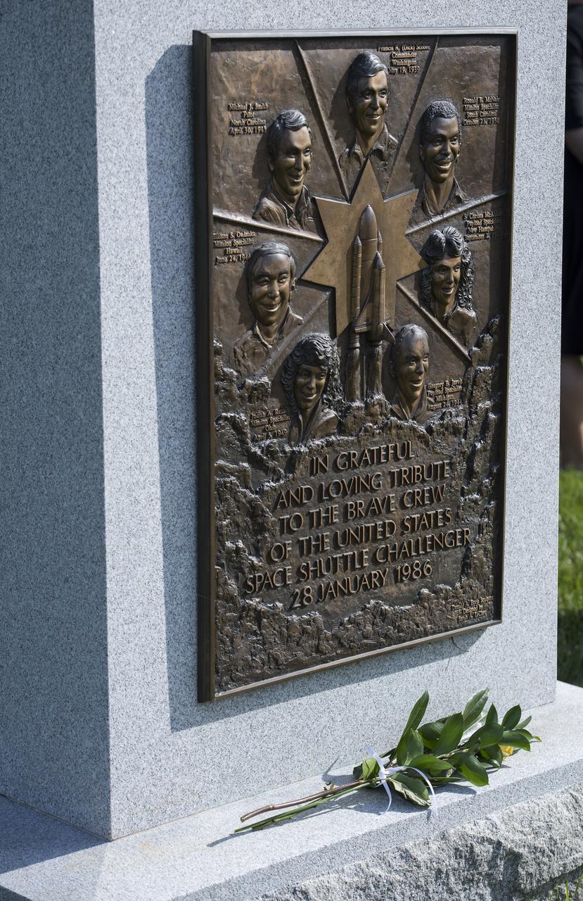 The Space Shuttle Challenger Memorial is seen just after NASA astronaut Joe Acaba placed a flower there, Friday, June 15, 2018 at Arlington National Cemetery in Arlington, Va. Photo Credit: (NASA/Aubrey Gemignani)