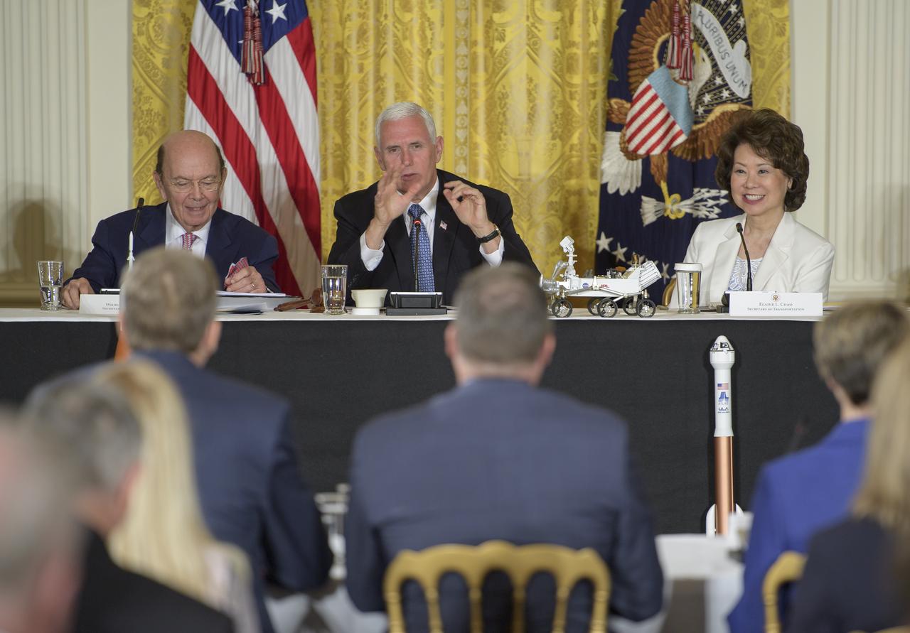 Vice President Mike Pence ask questions of former NASA astronauts Eileen Collins, Terry Virts and Scott Parazynski during a meeting of the National Space Council in the East Room of the White House, Monday, June 18, 2018, in Washington. Chaired by the Vice President, the council's role is to advise the President regarding national space policy and strategy, and review the nation's long-range goals for space activities. Photo Credit: (NASA/Bill Ingalls)