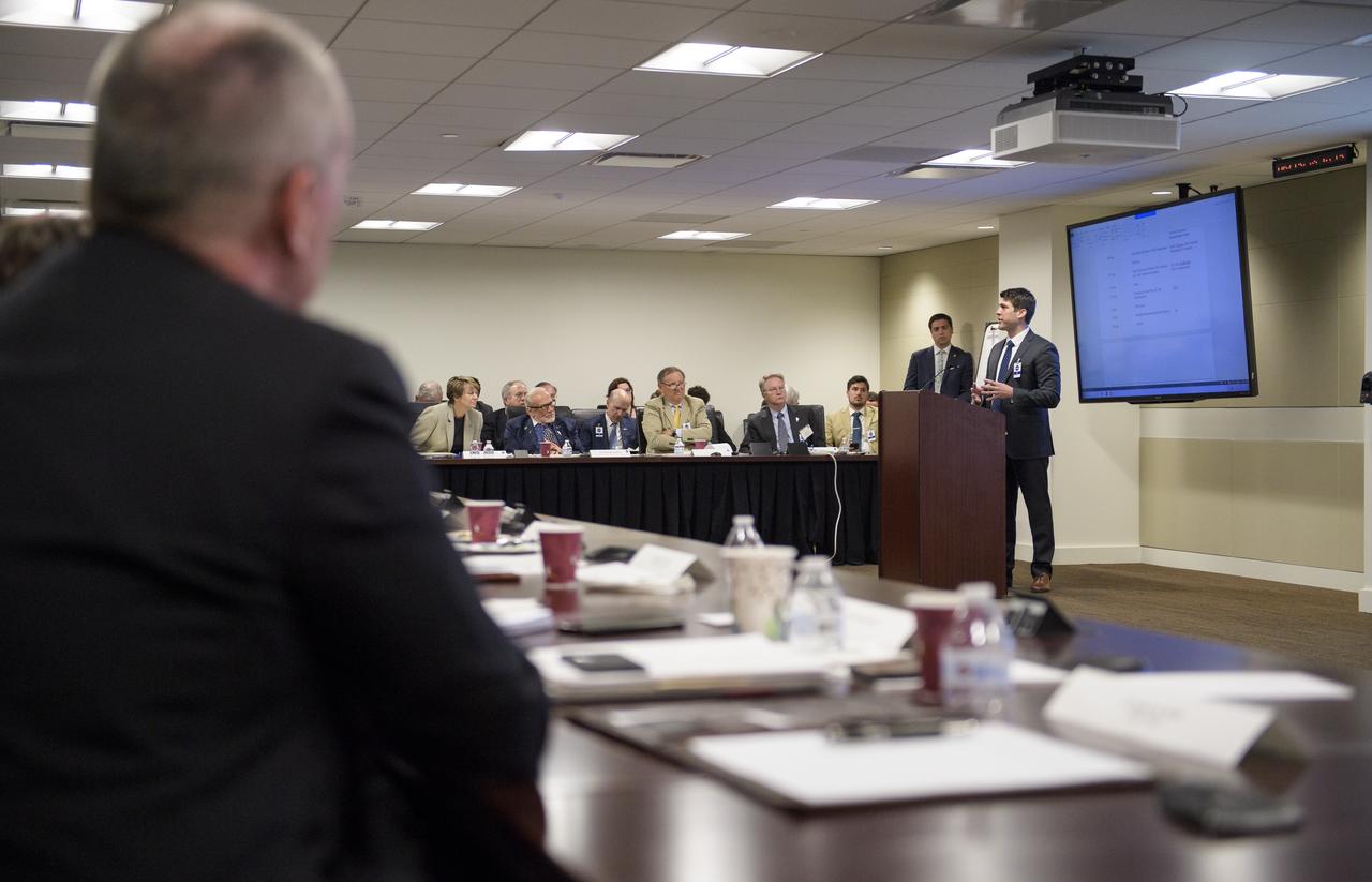 James Uthmeier, of the Department of Commerce, speaks about deregulation and space traffic management initiatives at the first meeting of the National Space Council Users' Advisory Group, Tuesday, June 19, 2018 at NASA Headquarters in Washington. The Users' Advisory Group will advise and inform the National Space Council on a broad range of aerospace topics, including the impacts of U.S. and international laws and regulations, national security space priorities, scientific and human space exploration priorities, and ways to bolster support. Photo Credit: (NASA/Joel Kowsky)