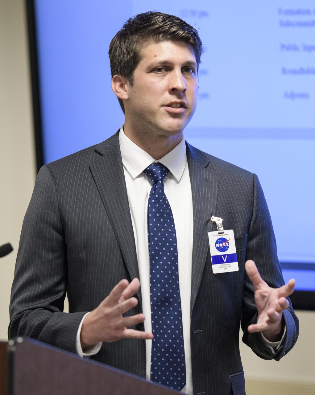 James Uthmeier, of the Department of Commerce, speaks about deregulation and space traffic management initiatives at the first meeting of the National Space Council Users' Advisory Group, Tuesday, June 19, 2018 at NASA Headquarters in Washington. The Users' Advisory Group will advise and inform the National Space Council on a broad range of aerospace topics, including the impacts of U.S. and international laws and regulations, national security space priorities, scientific and human space exploration priorities, and ways to bolster support. Photo Credit: (NASA/Joel Kowsky)