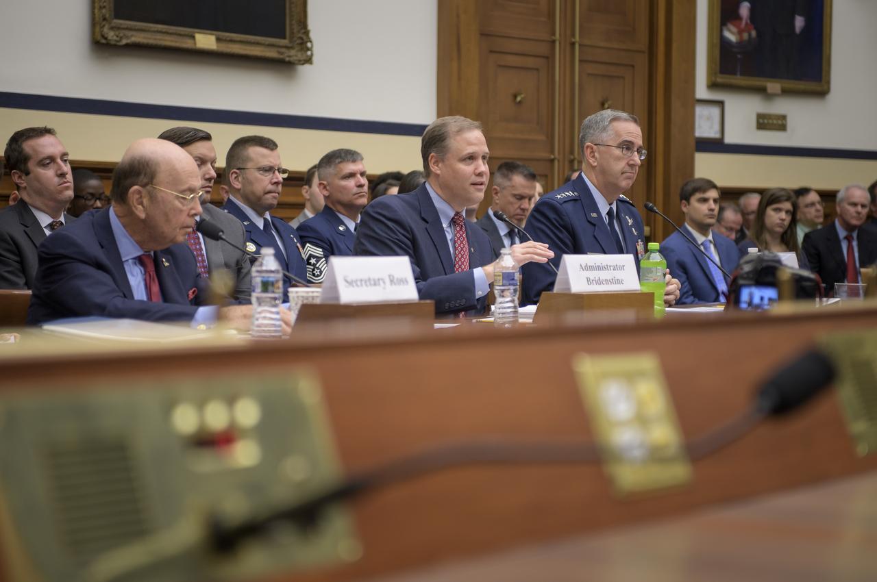 Secretary of Commerce Wilbur Ross, left, NASA Administrator Jim Bridenstine, center, and Commander, U.S. Strategic Command, General John Hyten testify before the House Subcommittee on Strategic Forces during a hearing on Space Situational Awareness: Whole of Government Perspectives on Roles and Responsibilities, Friday, June 22, 2018 at the Rayburn House Office Building in Washington. Photo Credit: (NASA/Bill Ingalls)