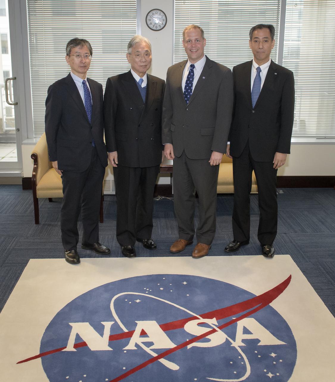 Shuzo Takada, Director General, Cabinet Office, Japan, left; Yoshiyuki Kasai, Chairman, National Space Policy Committee, Japan; Jim Bridenstine, NASA Administrator; and Hiroshi Yamakawa, President, Japan Aerospace Exploration Agency, right, pose for a photograph during a courtesy visit to discuss ongoing cooperation, Wednesday, June 27, 2018 at NASA Headquarters in Washington. Photo Credit: (NASA/Bill Ingalls)