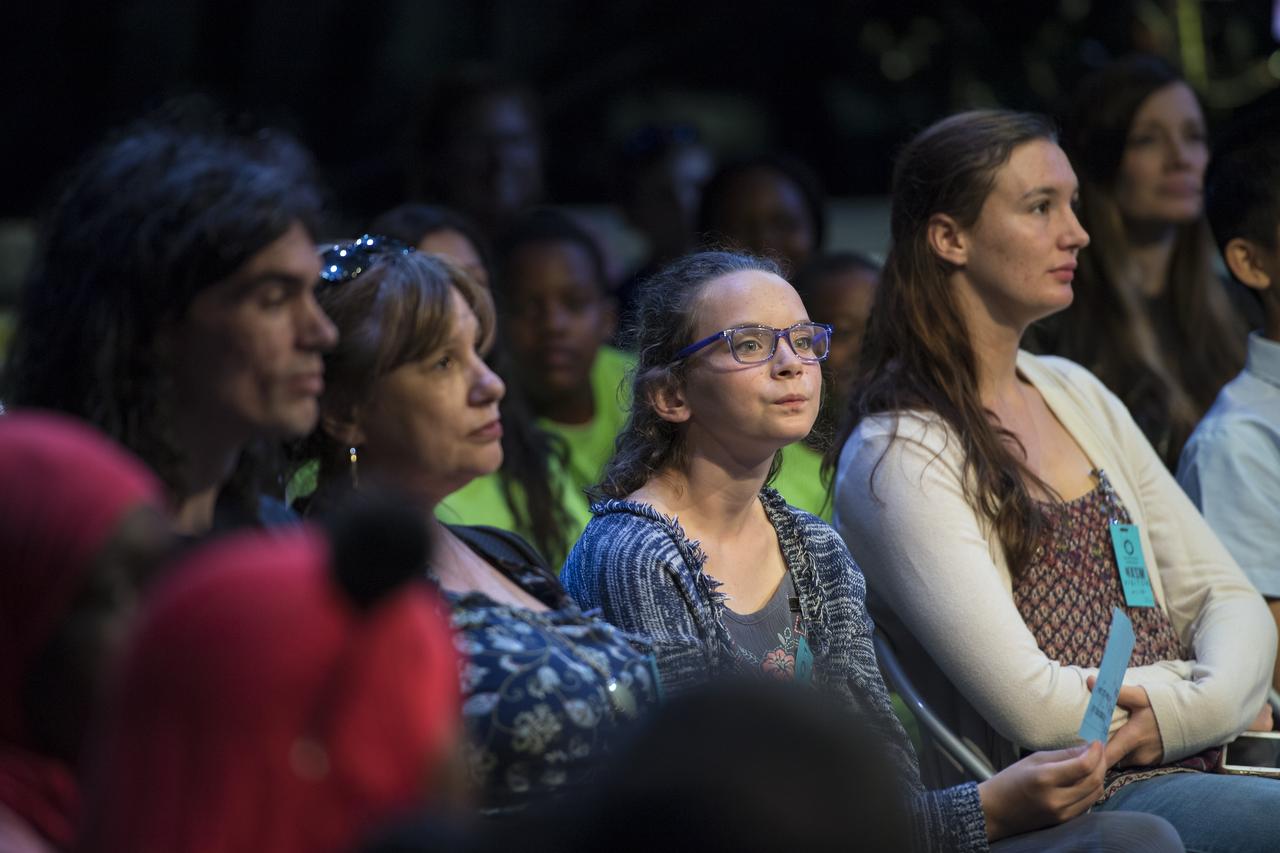 NASA astronaut Serena Auñon-Chancellor's niece, Anna Sophia, listens as Jason Crusan, director, NASA Advanced Exploration Systems (AES) Division, speaks with the STEM in 30 team Wednesday, June 27, 2018 at Smithsonian's National Air and Space Museum in Washington. Photo Credit: (NASA/Aubrey Gemignani)