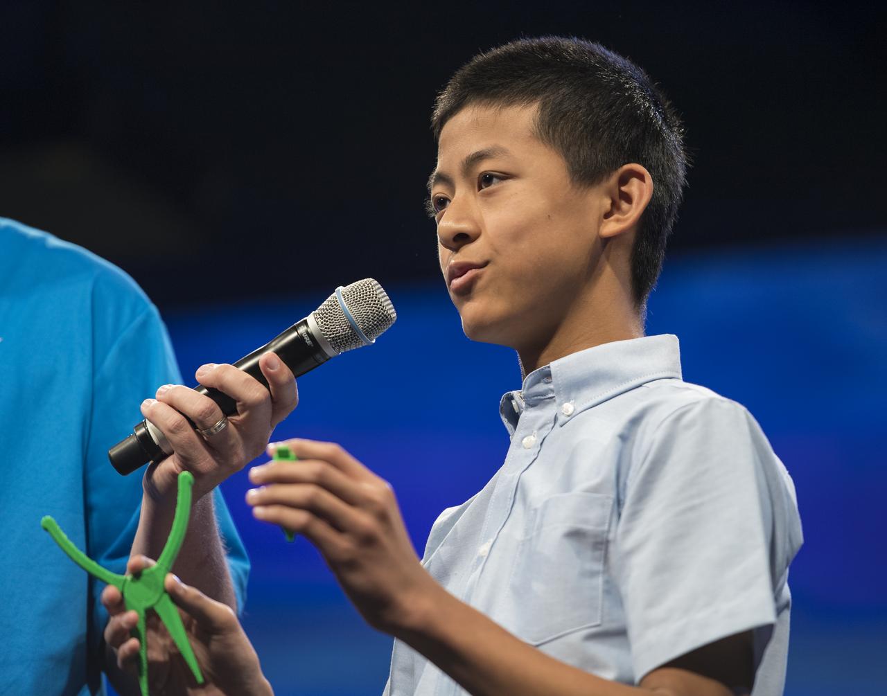 Future Engineers "Two for the Crew" competition winner, Jason Qin, speaks about his Two Pliers + 1 Handle, during a STEM in 30 event, Wednesday, June 27, 2018 at Smithsonian's National Air and Space Museum in Washington. Photo Credit: (NASA/Aubrey Gemignani)