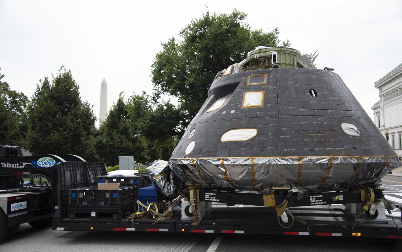 NASA's Orion spacecraft that flew Exploration Flight Test-1 on Dec. 5, 2014 is seen as it arrives at the White House complex, Saturday, July 21, 2018 in Washington, DC. Lockheed Martin, NASA’s prime contractor for Orion, began manufacturing the Orion crew module in 2011 and delivered it in July 2012 to NASA's Kennedy Space Center where final assembly, integration and testing was completed. More than 1,000 companies across the country manufactured or contributed elements to the spacecraft. Photo Credit: (NASA/Joel Kowsky)