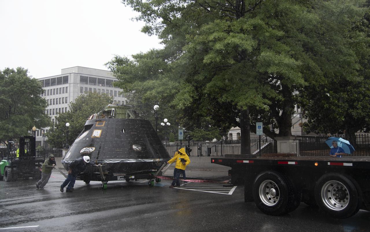 NASA's Orion spacecraft that flew Exploration Flight Test-1 on Dec. 5, 2014 is seen in front of the Eisenhower Executive Office Building on the White House complex, Saturday, July 21, 2018 in Washington, DC. Lockheed Martin, NASA’s prime contractor for Orion, began manufacturing the Orion crew module in 2011 and delivered it in July 2012 to NASA's Kennedy Space Center where final assembly, integration and testing was completed. More than 1,000 companies across the country manufactured or contributed elements to the spacecraft. Photo Credit: (NASA/Joel Kowsky)