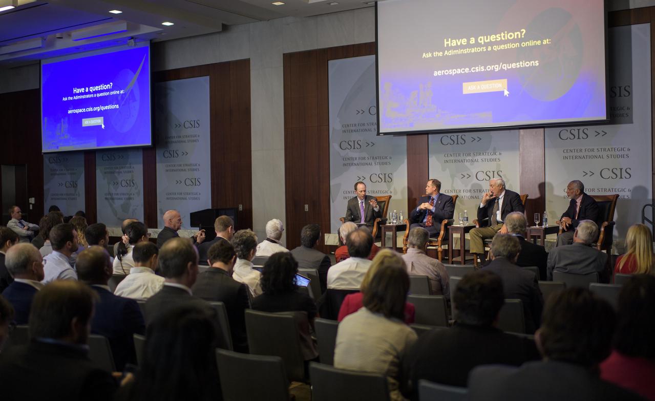 Todd Harrison, director of defense budget analysis and the aerospace security project, and senior fellow in the international security program at the Center for Strategic and International Studies, left, leads a discussion with NASA Administrator Jim Bridenstine, second from left, and former NASA Administrators Sean O'Keefe, second from right, and Charles Bolden, right, during an event celebrating NASA's 60th anniversary at the Center for Strategic and International Studies on Monday, July 23, 2018 in Washington. Bridenstine, O'Keefe, and Bolden answered questions about the past and future of the agency. (Photo Credit: NASA/Joel Kowsky)