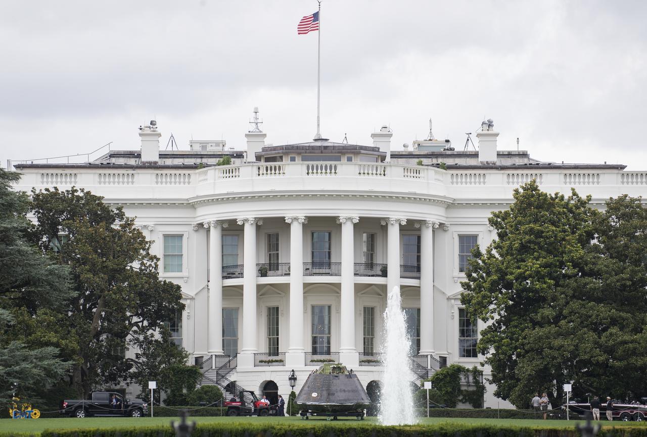 NASA's Orion spacecraft that flew on Exploration Flight Test-1 on Dec. 5, 2014, is seen on the south lawn of the White House during a Made in America Product Showcase, Monday, July 23, 2018 in Washington.  Lockheed Martin, NASA’s prime contractor for Orion, began manufacturing the Orion crew module in 2011 and delivered it in July 2012 to NASA's Kennedy Space Center where final assembly, integration and testing was completed. More than 1,000 companies across the country manufactured or contributed elements to the spacecraft. Photo Credit: (NASA/Aubrey Gemignani)