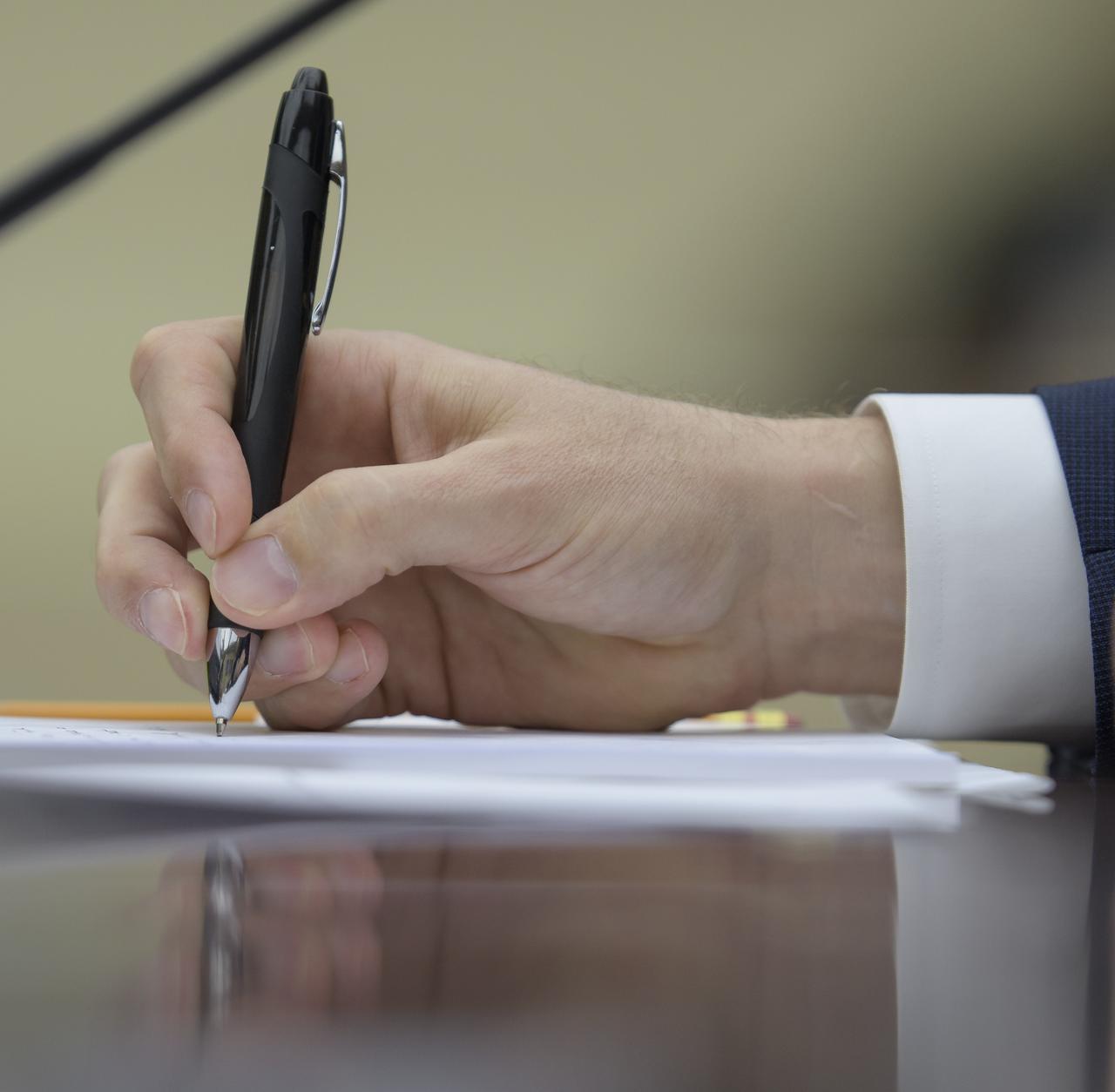 NASA Administrator Jim Bridenstine makes notes as he testifies before the House Committee on Science, Space, and Technology during a hearing on the James Webb Space Telescope, Wednesday, July 25, 2018 at the Rayburn House Office Building in Washington. Photo Credit: (NASA/Bill Ingalls)