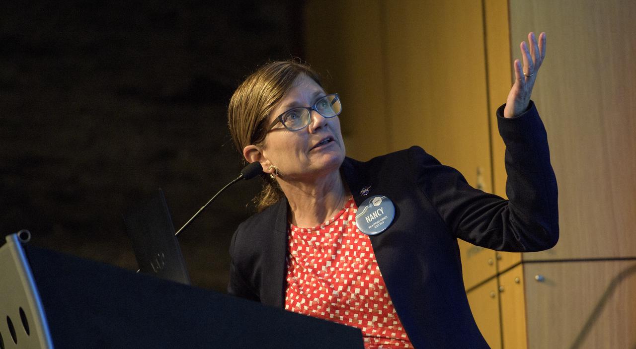 Capacity Building Program Manager for NASA's Applied Sciences Program (Earth Science Division) Nancy Searby speaks during the 2018 Annual Earth Science Applications Showcase, Wednesday, Aug. 1, 2018 at NASA Headquarters in Washington. Every summer students and young professionals from NASA’s Applied Sciences’ DEVELOP National Program come to NASA Headquarters and present their research projects. DEVELOP is a training and development program where students work on Earth science research projects, mentored by science advisers from NASA and partner agencies, and extend research results to local communities.  Photo Credit: (NASA/Joel Kowsky)