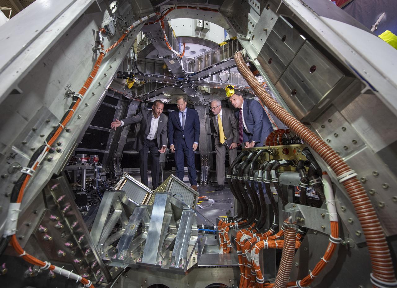 NASA Orion AA-2 Crew Module Manager Dr. Jon Olansen, left, NASA Administrator Jim Bridenstine, NASA Johnson Space Center Director Mark Geyer, and Orion Program Manager Mark Kirasich, right, are seen inside the Orion test crew capsule for the Ascent Abort-2 (AA-2) test, Thursday, Aug. 2, 2018 at NASA’s Johnson Space Center in Houston, Texas. Photo Credit: (NASA/Bill Ingalls)