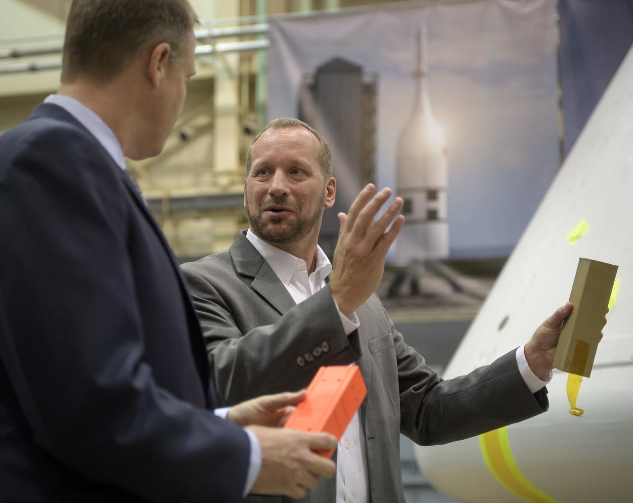 NASA Administrator Jim Bridenstine, left, listens as Orion AA-2 Crew Module Manager Dr. Jon Olansen discusses the Orion test crew capsule that will be used for the Ascent Abort-2 (AA-2) test, Thursday, Aug. 2, 2018 at NASA’s Johnson Space Center in Houston, Texas. Photo Credit: (NASA/Bill Ingalls)