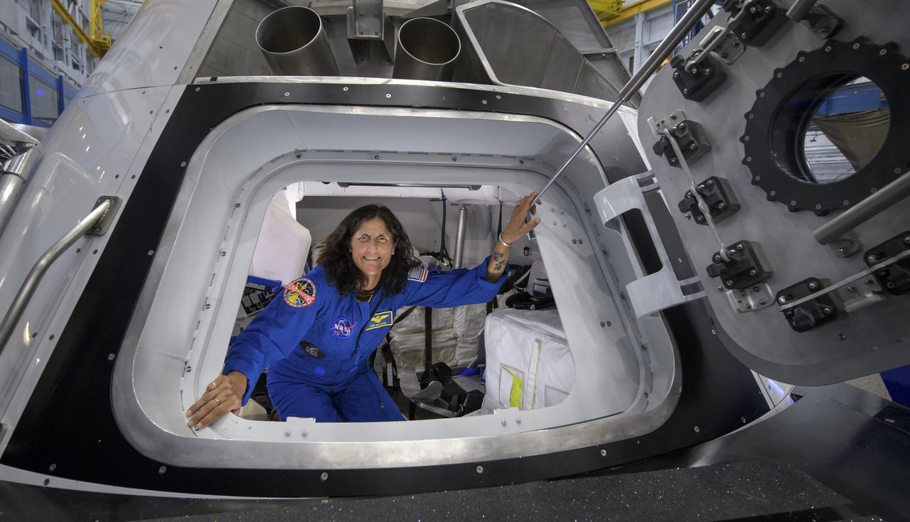 NASA astronaut Suni Williams stops to pose for photograph as she exits the Boeing Mockup Trainer at NASA’s Johnson Space Center in Houston, Texas on Aug. 2, 2018 ahead of the commercial crew flight assignments announcement Aug. 3. Williams and NASA astronaut Josh Cassada were assigned to launch aboard Boeing’s CST-100 Starliner on the company’s first operational mission to the International Space Station in partnership with NASA’s Commercial Crew Program. Photo Credit: (NASA/Bill Ingalls)