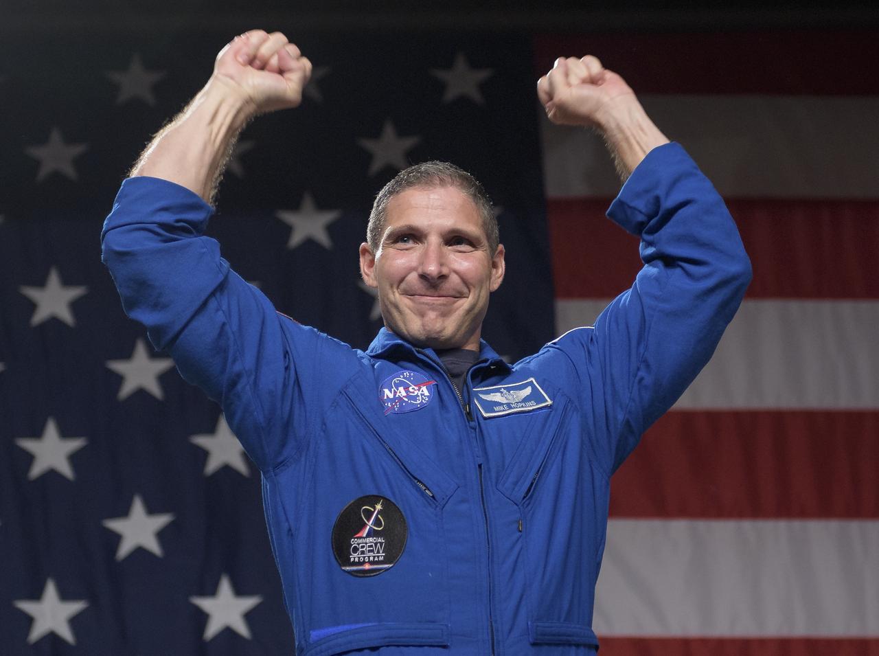 NASA astronaut Mike Hopkins is seen during a NASA event where it was announced that he, and NASA astronaut Victor Glover are assigned to the first mission to the International Space Station onboard SpaceX’s Crew Dragon, Friday, Aug. 3, 2018 at NASA’s Johnson Space Center in Houston, Texas. Astronauts assigned to crew the first flight tests and missions of the Boeing CST-100 Starliner and SpaceX Crew Dragon where announced during the event. Photo Credit: (NASA/Bill Ingalls)