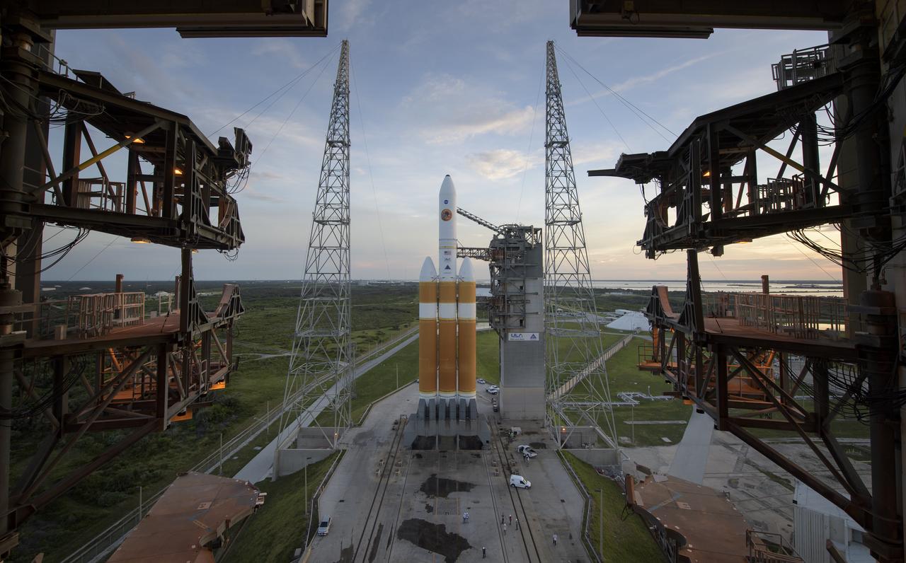 The United Launch Alliance Delta IV Heavy rocket with the Parker Solar Probe onboard is seen shortly after the Mobile Service Tower was  rolled back, Friday, Aug. 10, 2018, Launch Complex 37 at Cape Canaveral Air Force Station in Florida. Parker Solar Probe is humanity’s first-ever mission into a part of the Sun’s atmosphere called the corona.  Here it will directly explore solar processes that are key to understanding and forecasting space weather events that can impact life on Earth. Photo Credit: (NASA/Bill Ingalls)