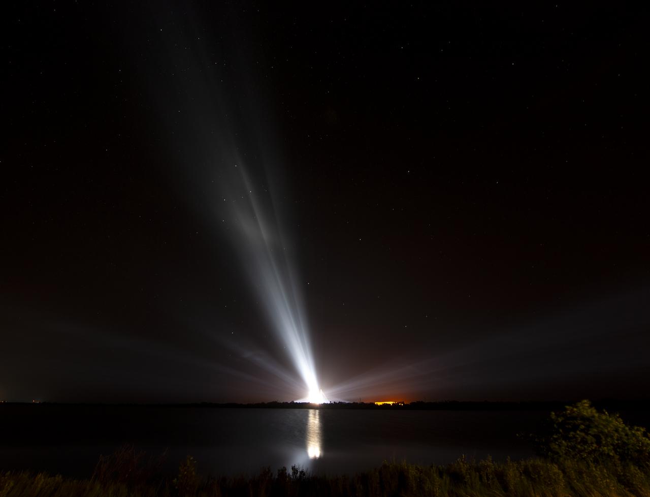 The United Launch Alliance Delta IV Heavy rocket with the Parker Solar Probe is illuminated ahead of launch, Saturday, Aug. 11, 2018, Launch Complex 37 at Cape Canaveral Air Force Station in Florida. Parker Solar Probe is humanity’s first-ever mission into a part of the Sun’s atmosphere called the corona.  Here it will directly explore solar processes that are key to understanding and forecasting space weather events that can impact life on Earth. Photo Credit: (NASA/Bill Ingalls)