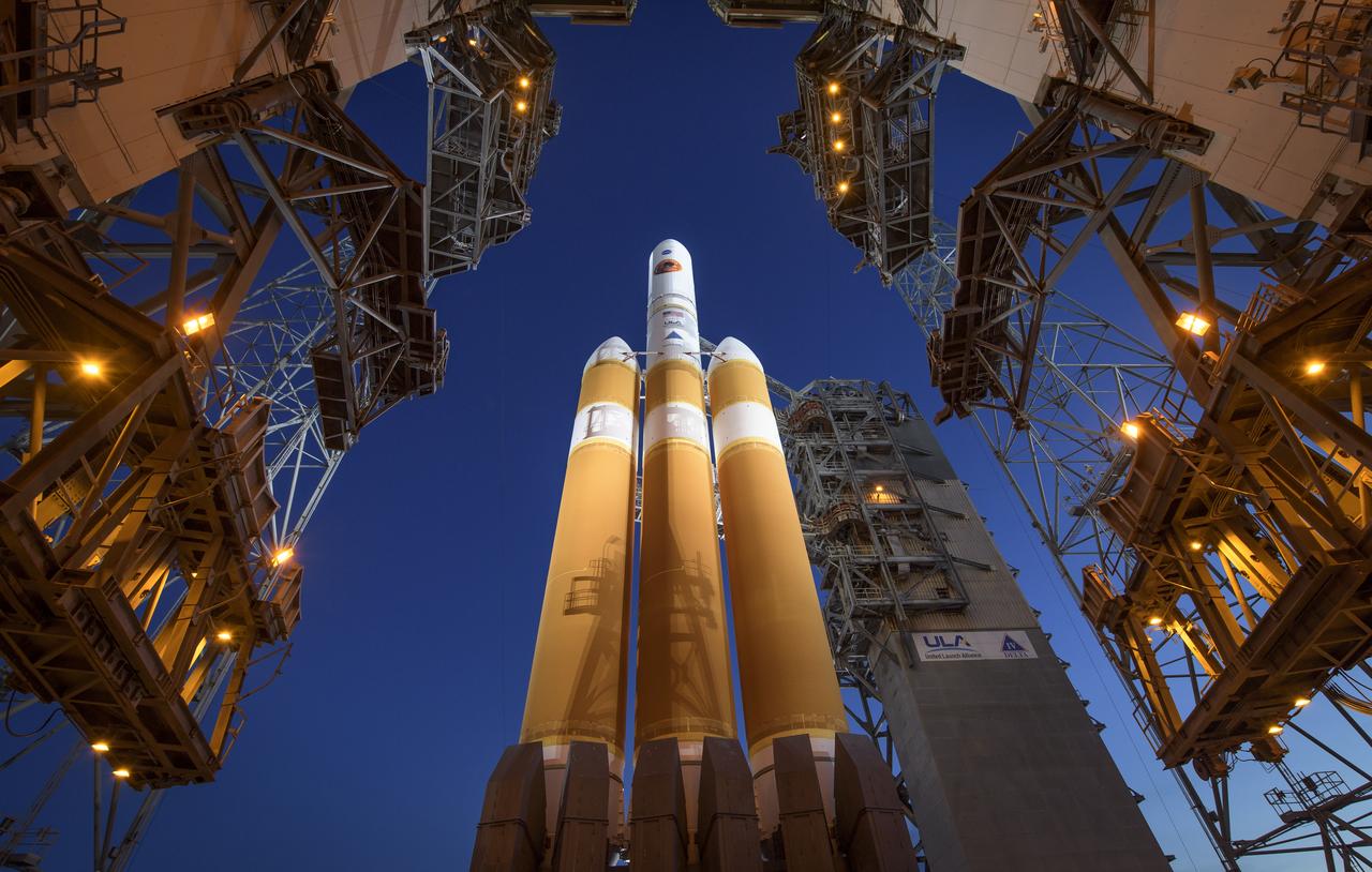 The Mobile Service Tower is rolled back to reveal the United Launch Alliance Delta IV Heavy rocket with the Parker Solar Probe onboard, Saturday, Aug. 11, 2018, Launch Complex 37 at Cape Canaveral Air Force Station in Florida. Parker Solar Probe is humanity’s first-ever mission into a part of the Sun’s atmosphere called the corona.  Here it will directly explore solar processes that are key to understanding and forecasting space weather events that can impact life on Earth. Photo Credit: (NASA/Bill Ingalls)