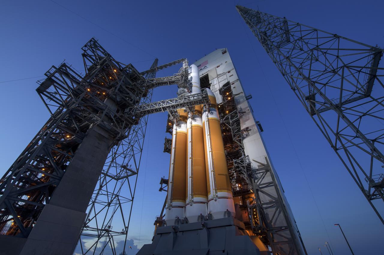 The Mobile Service Tower is rolled back to reveal the United Launch Alliance Delta IV Heavy rocket with the Parker Solar Probe onboard, Saturday, Aug. 11, 2018, Launch Complex 37 at Cape Canaveral Air Force Station in Florida. Parker Solar Probe is humanity’s first-ever mission into a part of the Sun’s atmosphere called the corona.  Here it will directly explore solar processes that are key to understanding and forecasting space weather events that can impact life on Earth. Photo Credit: (NASA/Bill Ingalls)