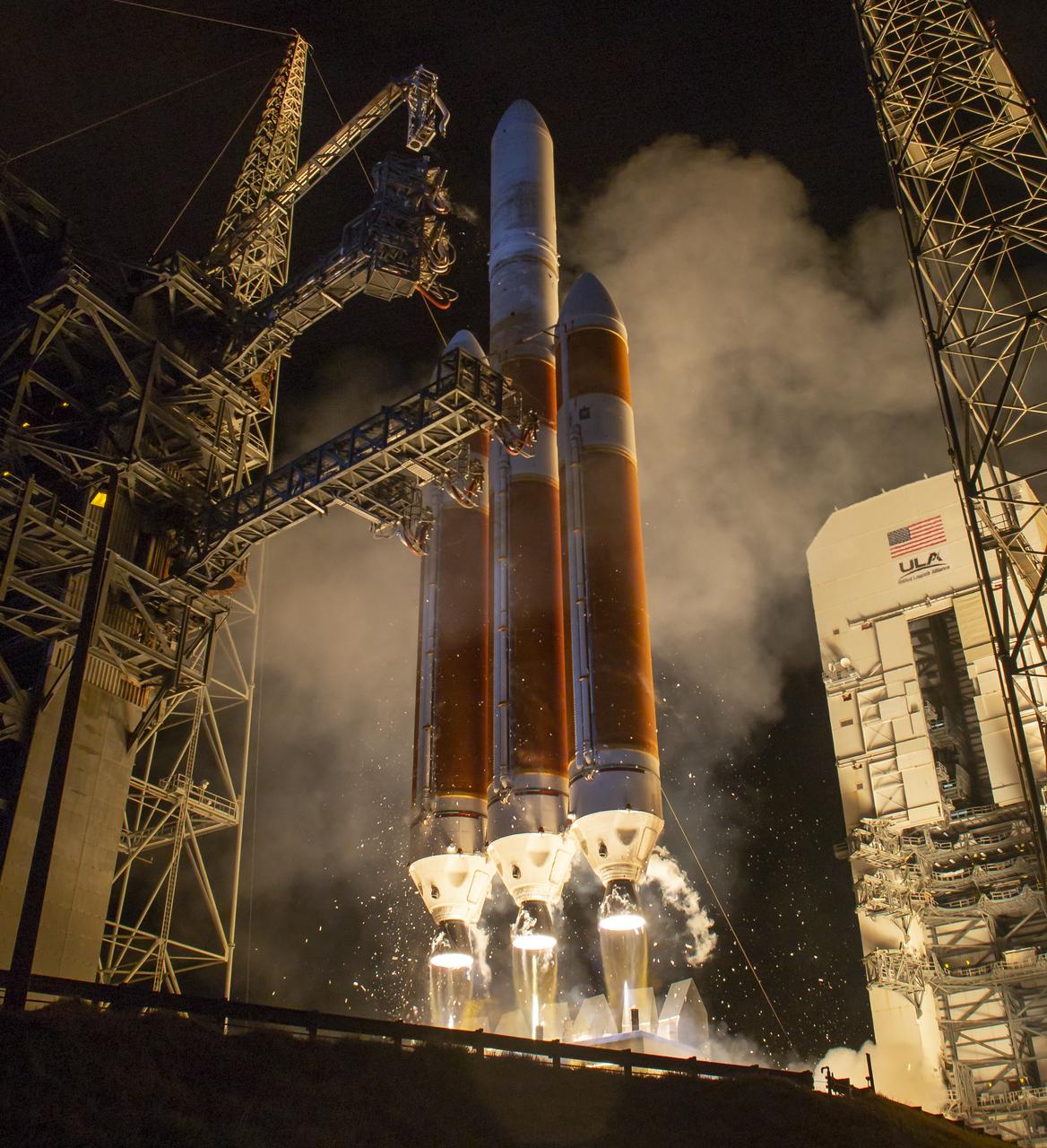 The United Launch Alliance Delta IV Heavy rocket launches NASA's Parker Solar Probe to touch the Sun, Sunday, Aug. 12, 2018 from Launch Complex 37 at Cape Canaveral Air Force Station, Florida. Parker Solar Probe is humanity’s first-ever mission into a part of the Sun’s atmosphere called the corona. Here it will directly explore solar processes that are key to understanding and forecasting space weather events that can impact life on Earth. Photo Credit: (NASA/Bill Ingalls)