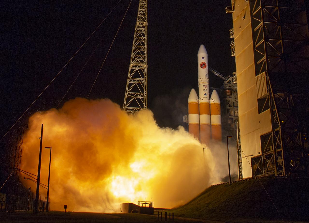 The United Launch Alliance Delta IV Heavy rocket launches NASA's Parker Solar Probe to touch the Sun, Sunday, Aug. 12, 2018 from Launch Complex 37 at Cape Canaveral Air Force Station, Florida. Parker Solar Probe is humanity’s first-ever mission into a part of the Sun’s atmosphere called the corona. Here it will directly explore solar processes that are key to understanding and forecasting space weather events that can impact life on Earth. Photo Credit: (NASA/Bill Ingalls)