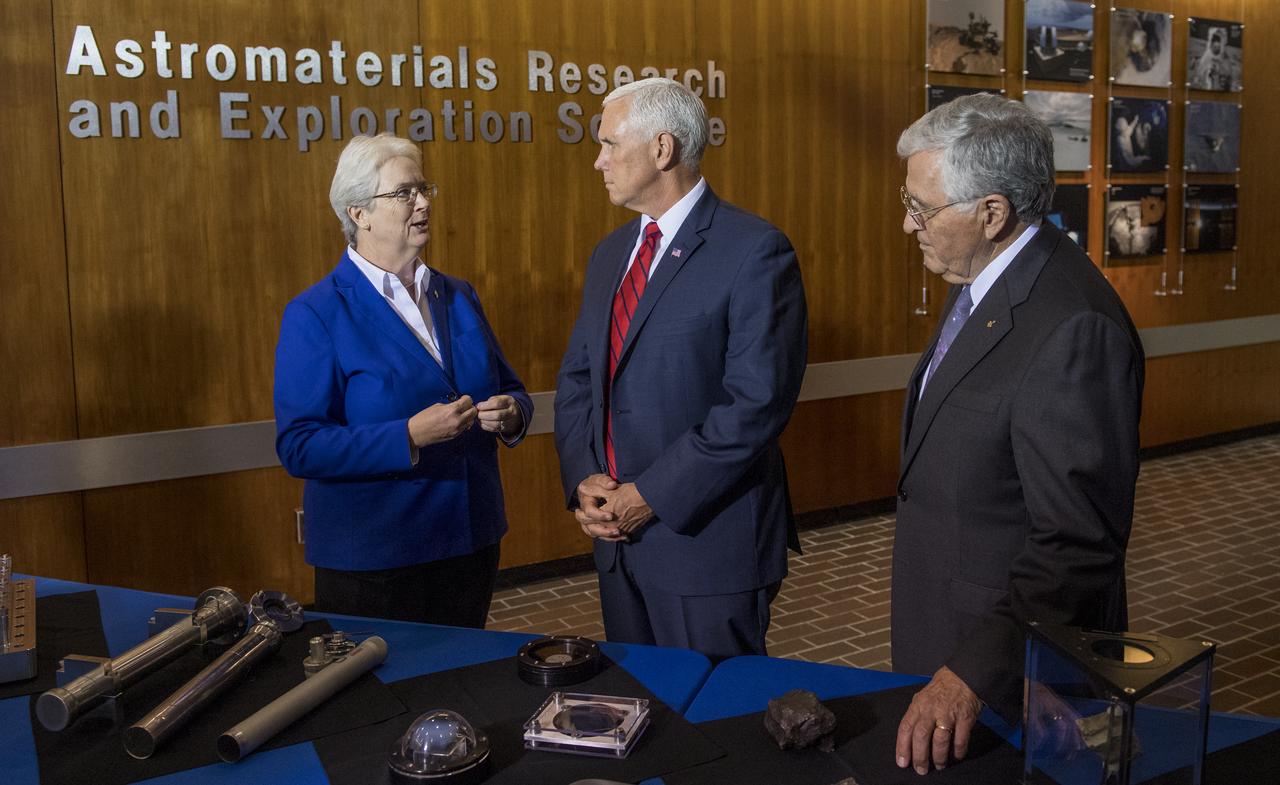 Acting director of the Exploration Integration and Science Directorate and Chief Scientist at NASA's Johnson Space Center Dr. Eileen Stansbery, right, is seen with Vice President Mike Pence and Apollo 17 astronaut and geologist Dr. Harrison Schmitt in the Astromaterials Curation Laboratory at NASA's Johnson Space Center, Thursday, Aug. 23, 2018 in Houston, Texas.  Photo Credit: (NASA/Joel Kowsky)
