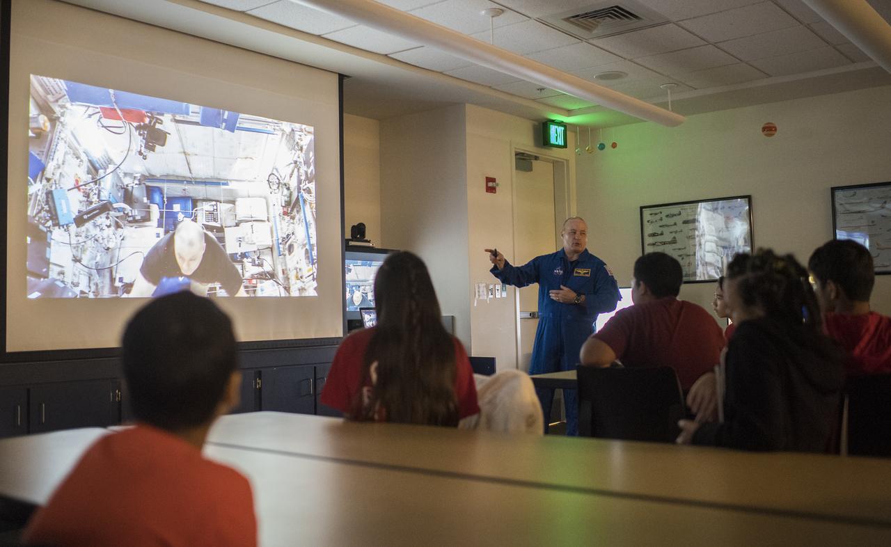 NASA astronaut Scott Tingle speaks to students about his time onboard the International Space Station, Wednesday, Sept. 12, 2018 at the Smithsonian National Air and Space Museum's Steven F. Udvar-Hazy Center in Chantilly, Va. Tingle spent 168 days onboard the International Space Station as part of Expeditions 54 and 55. Photo Credit: (NASA/Joel Kowsky)