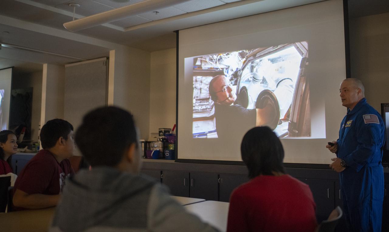 NASA astronaut Scott Tingle speaks to students about his time onboard the International Space Station, Wednesday, Sept. 12, 2018 at the Smithsonian National Air and Space Museum's Steven F. Udvar-Hazy Center in Chantilly, Va. Tingle spent 168 days onboard the International Space Station as part of Expeditions 54 and 55. Photo Credit: (NASA/Joel Kowsky)