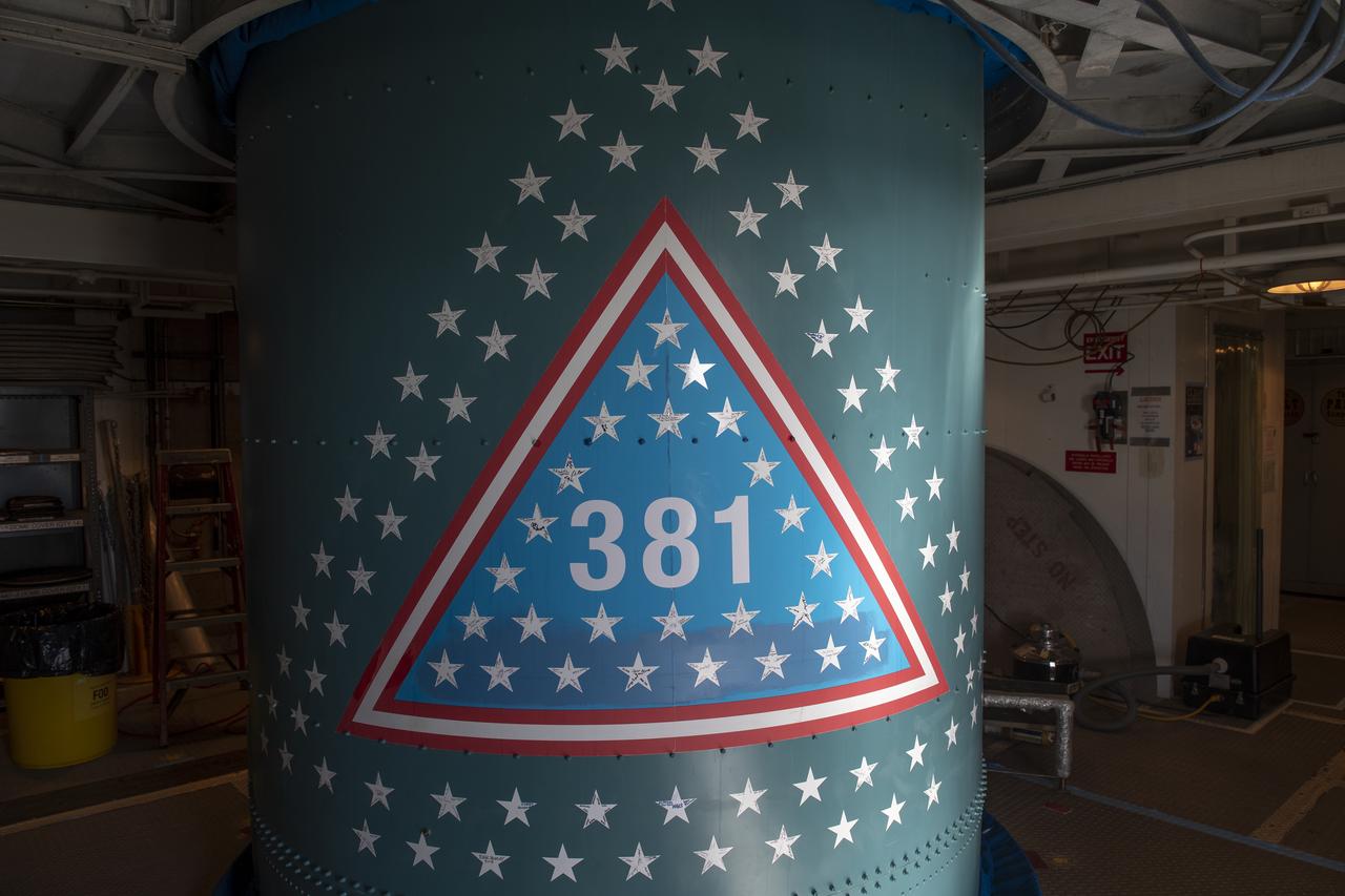 An emblem signifying the 381st flight of the United Launch Alliance Delta family is seen on the Delta II rocket, with the NASA Ice, Cloud and land Elevation Satellite-2 (ICESat-2) onboard, Wednesday, Sept. 12, 2018, at Vandenberg Air Force Base in California. The first Delta I was launched in May 1960. A star traditionally was placed on the rocket to recognize each mission. For the final Delta II, stars were sent to team members and partners throughout the nation. This rocket boasts more than 150 stars with over 800 signatures of people who have been part of the Delta II program. The ICESat-2 mission will measure the changing height of Earth's ice. Photo Credit: (NASA/Bill Ingalls)