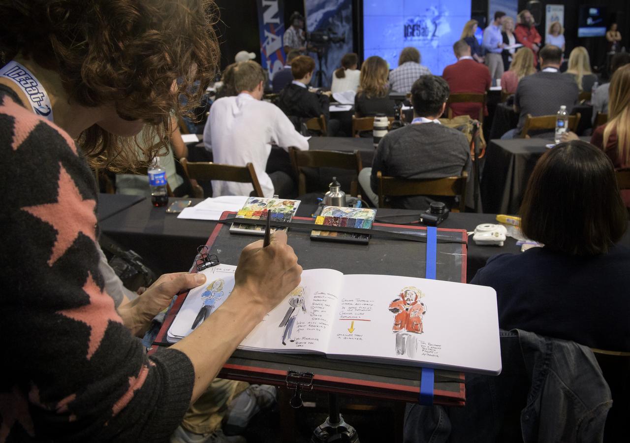 Artist and NASA social media attendee Maria Coryell-Martin captures a prelaunch briefing for the NASA Ice, Cloud and land Elevation Satellite-2 (ICESat-2), Thursday, Sept. 13, 2018, at Vandenberg Air Force Base in California. The ICESat-2 mission will measure the changing height of Earth's ice. Photo Credit: (NASA/Bill Ingalls)