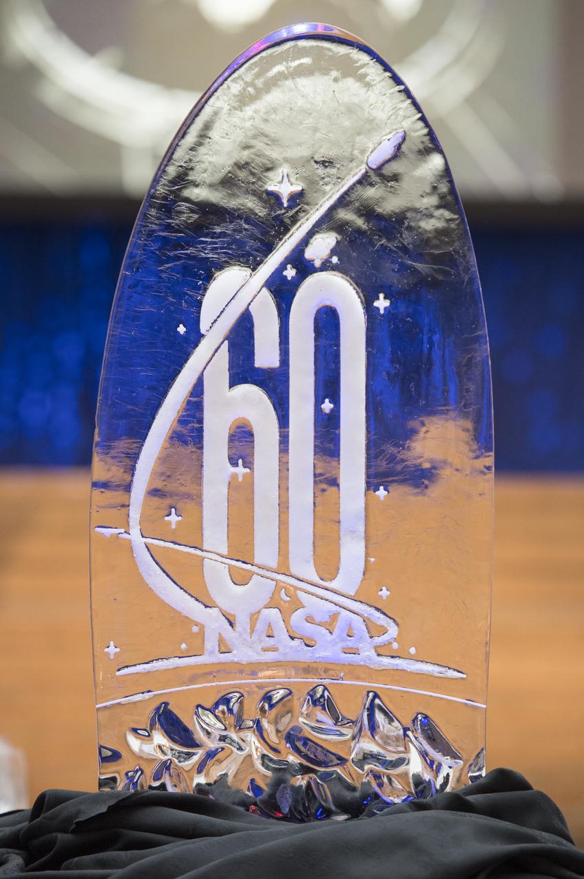 An ice sculpture of NASA's 60th anniversary logo is seen during a reception hosted by the American Institute of Aeronautics and Astronautics (AIAA) to celebrate NASA's 60th anniversary, Thursday, Sept. 20, 2018 at the Ronald Reagan Building and International Trade Center in Washington, DC.  Photo Credit: (NASA/Joel Kowsky)