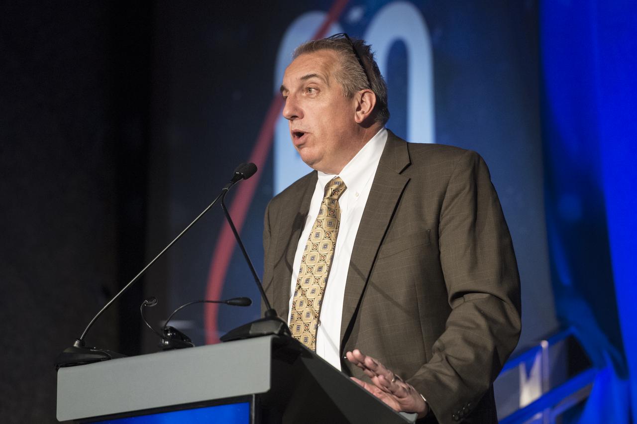 NASA's Deputy Associate Administrator for Strategy in the Aeronautics Mission Directorate Robert Pearce speaks during a reception hosted by the American Institute of Aeronautics and Astronautics (AIAA) to celebrate NASA's 60th anniversary, Thursday, Sept. 20, 2018 at the Ronald Reagan Building and International Trade Center in Washington, DC. Photo Credit: (NASA/Joel Kowsky)