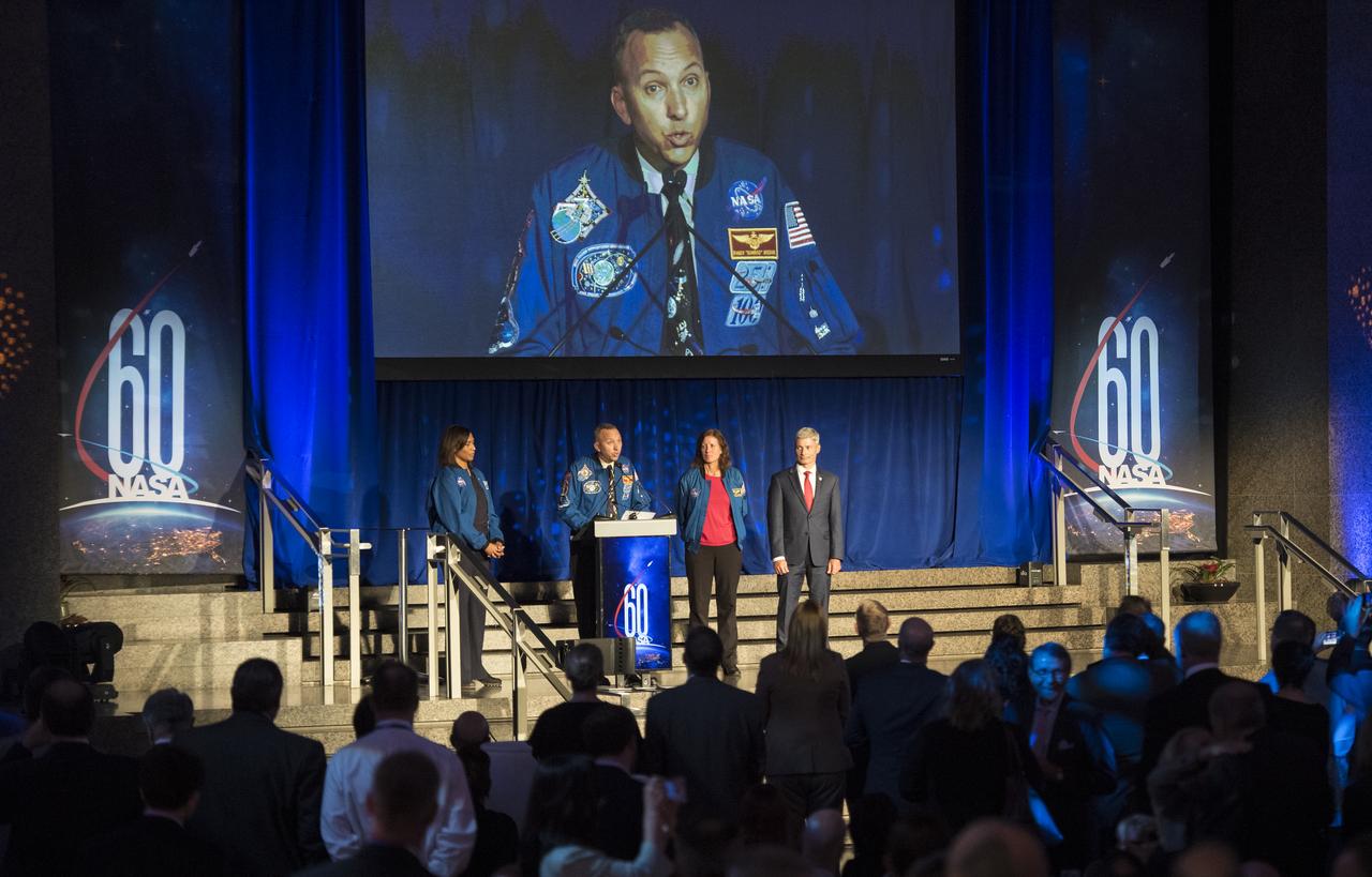 NASA astronauts Jeanette Epps, Randy Bresnik, Shannon Walker, and Mark Vande Hei are seen on stage during a reception hosted by the American Institute of Aeronautics and Astronautics (AIAA) to celebrate NASA's 60th anniversary, Thursday, Sept. 20, 2018 at the Ronald Reagan Building and International Trade Center in Washington, DC. Photo Credit: (NASA/Joel Kowsky)