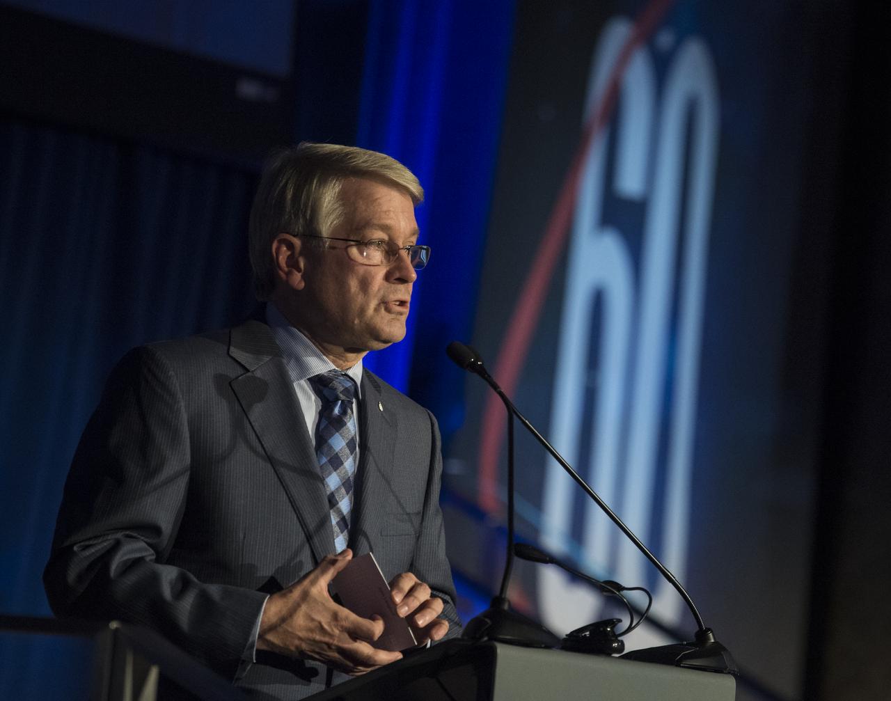 American Institute of Aeronautics and Astronautics (AIAA) President John Langford delivers remarks during a reception hosted by the American Institute of Aeronautics and Astronautics (AIAA) to celebrate NASA's 60th anniversary, Thursday, Sept. 20, 2018 at the Ronald Reagan Building and International Trade Center in Washington, DC.  Photo Credit: (NASA/Joel Kowsky)