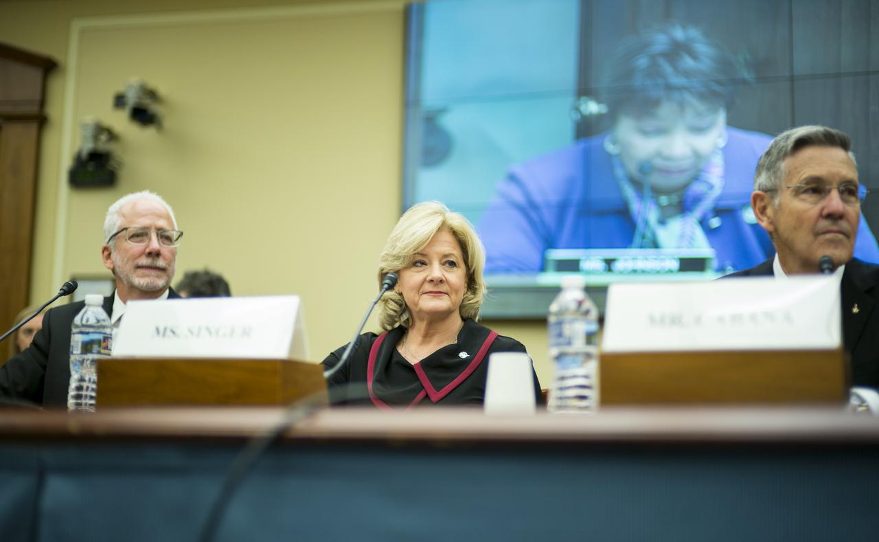 Mark Geyer, Director of NASA's Johnson Space Center, left, Jody Singer, Director of NASA's Marshall Space Flight Center, center, and Robert Cabana, Director of NASA's Kennedy Space Center, right, listen to Rep. Eddie Berniece Johnson, D-Texas, during a House Subcommittee on Space hearing titled "60 Years of NASA Leadership in Human Space Exploration: Past, Present, and Future," Wednesday, Sept. 26, 2018 at the Rayburn House Office Building in Washington. Photo Credit: (NASA/Joel Kowsky)