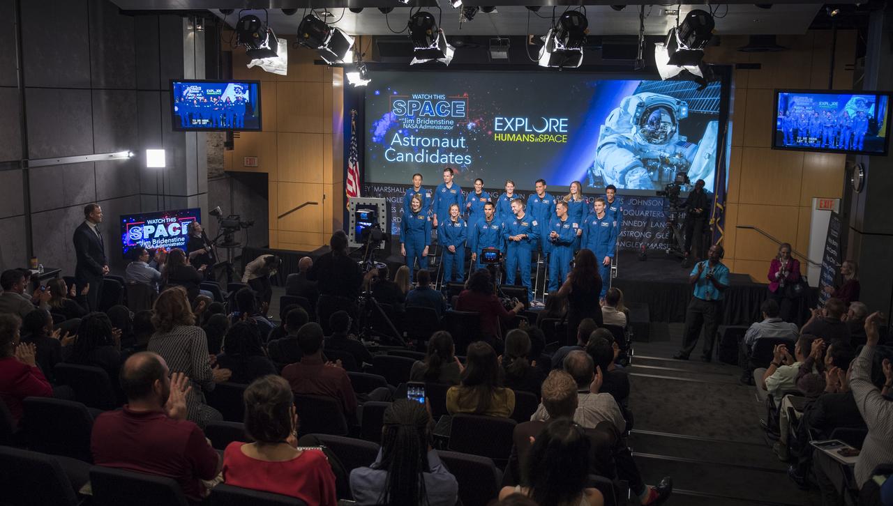 NASA Administrator Jim Bridenstine introduces the 2017 astronaut candidates during a live episode of the Administrator's monthly chat show, Watch This Space,  Thursday, Sept. 27, 2018 in the Webb Auditorium at NASA Headquarters in Washington. NASA's newest astronaut candidate class has started their two years of training, after which the new astronaut candidates could be assigned to missions performing research on the International Space Station, launching from American soil on spacecraft built by commercial companies, and launching on deep space missions on NASA’s new Orion spacecraft and Space Launch System rocket.  Photo Credit: (NASA/Joel Kowsky)