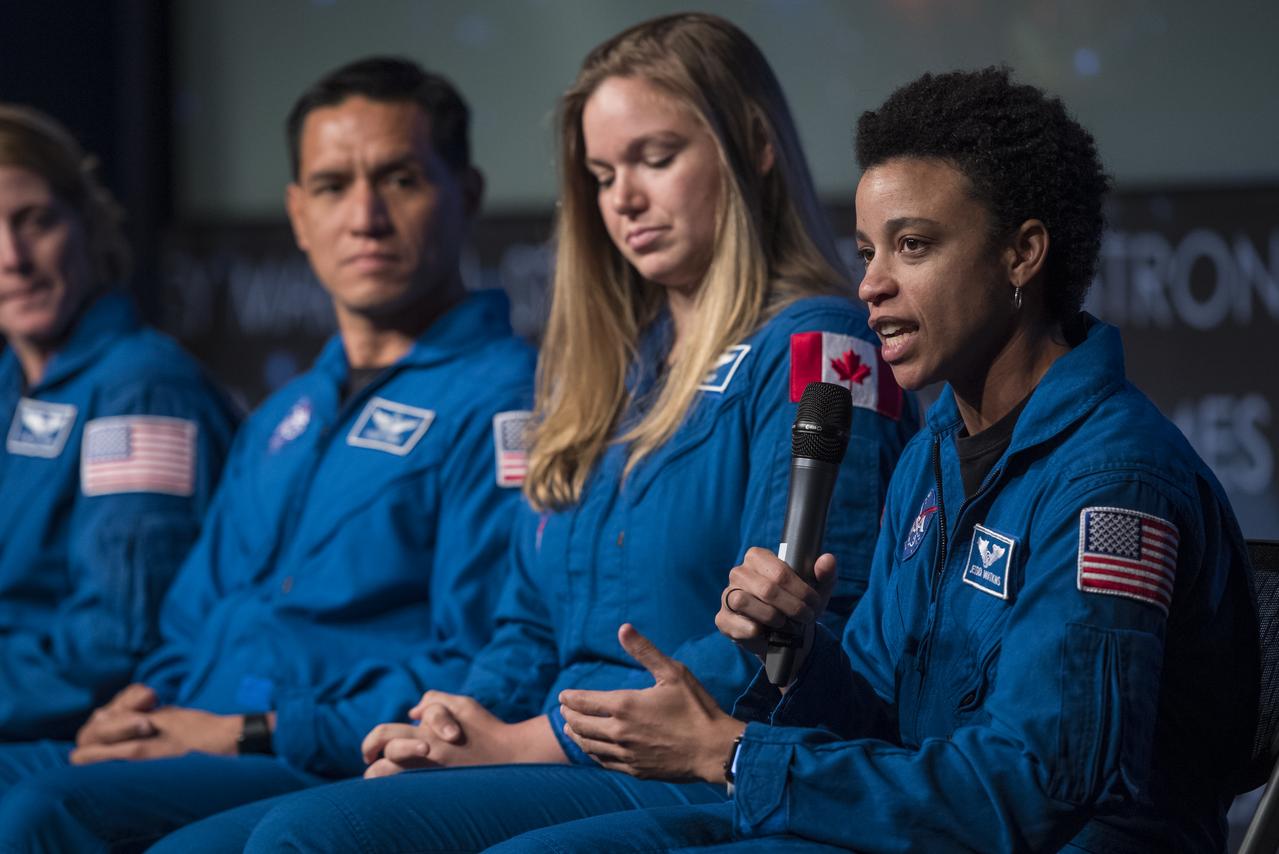 NASA astronaut candidate Jessica Watkins answers a question during a live episode of the Administrator's monthly chat show, Watch This Space, Thursday, Sept. 27, 2018 in the Webb Auditorium at NASA Headquarters in Washington. NASA's newest astronaut candidate class has started their two years of training, after which the new astronaut candidates could be assigned to missions performing research on the International Space Station, launching from American soil on spacecraft built by commercial companies, and launching on deep space missions on NASA’s new Orion spacecraft and Space Launch System rocket. Photo Credit: (NASA/Joel Kowsky)
