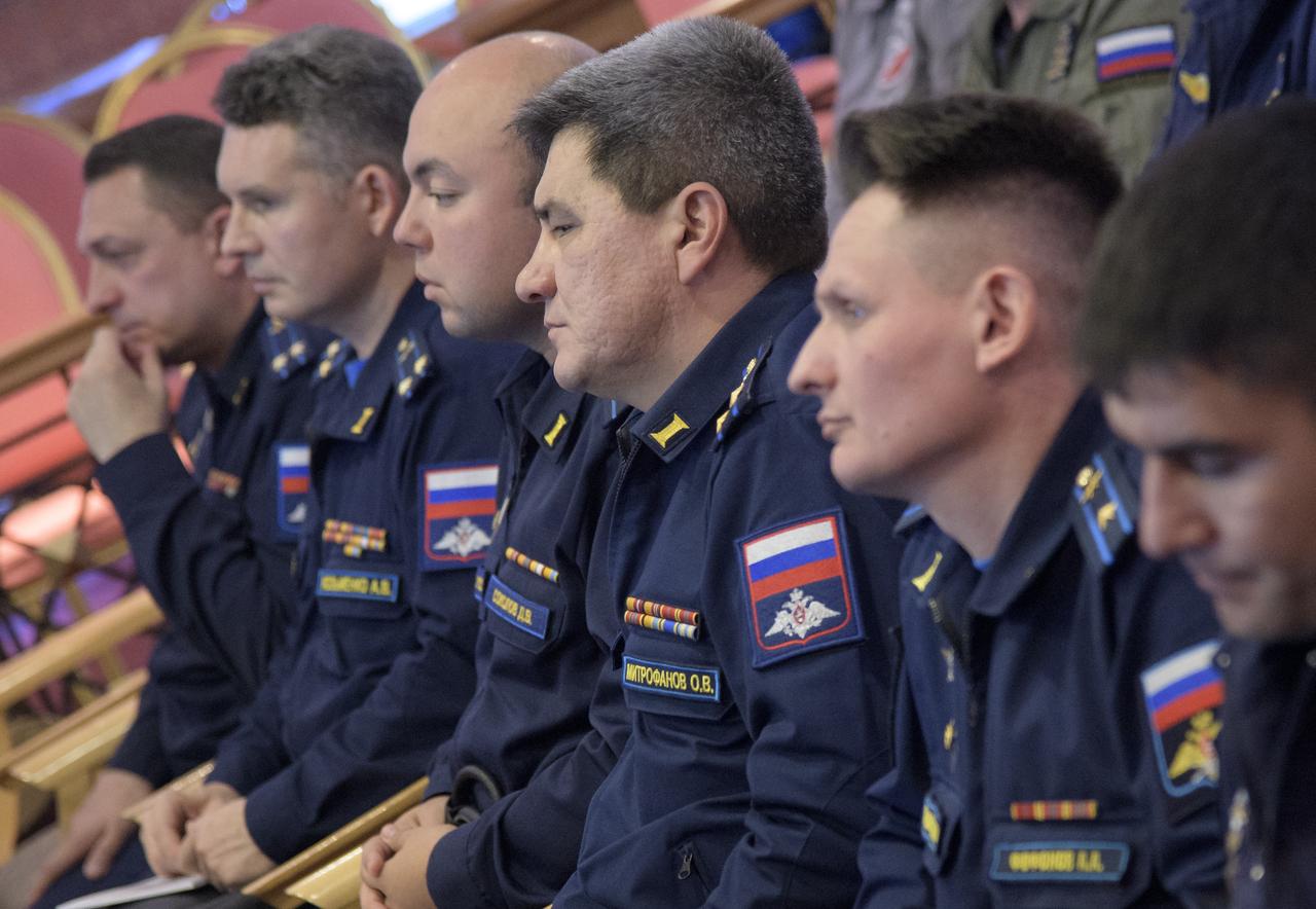 NASA and Roscosmos team members, along with Russian Search and Recovery Forces, meet at the Cosmonaut Hotel in Karaganda, Kazakhstan to discuss the readiness for the landing of Expedition 56 Commander Drew Feustel and Flight Engineer Ricky Arnold of NASA, along with Flight Engineer and Soyuz Commander Oleg Artemyev of Roscosmos Tuesday, Oct. 2, 2018. Feustel, Arnold, and Artemyev are returning after 197 days in space where they served as members of the Expedition 55 and 56 crews onboard the International Space Station. Photo Credit: (NASA/Bill Ingalls)