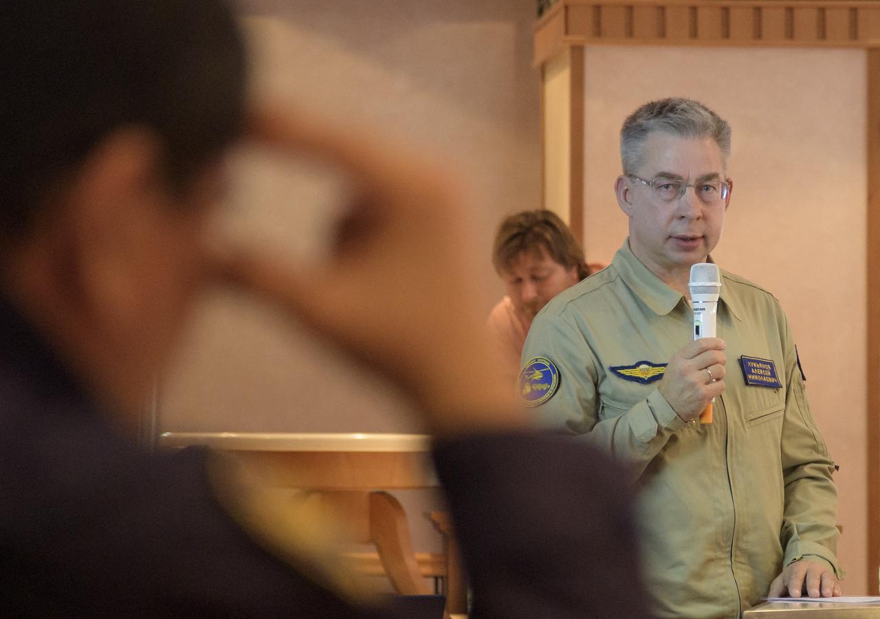 Deputy Head of the Search-and-Rescue Department of Rosaviatsiya (Russian Federal Air Transport Agency) Aleksey Lukiyanov gives a report during a meeting of NASA, Roscosmos and Russian Search and Recovery Forces to review the readiness for the landing of Expedition 56 crew members Drew Feustel and Ricky Arnold of NASA, along with Oleg Artemyev of Roscosmos Tuesday, Oct. 2, 2018, at the Cosmonaut Hotel in Karaganda, Kazakhstan. Feustel, Arnold, and Artemyev are returning after 197 days in space where they served as members of the Expedition 55 and 56 crews onboard the International Space Station. Photo Credit: (NASA/Bill Ingalls)