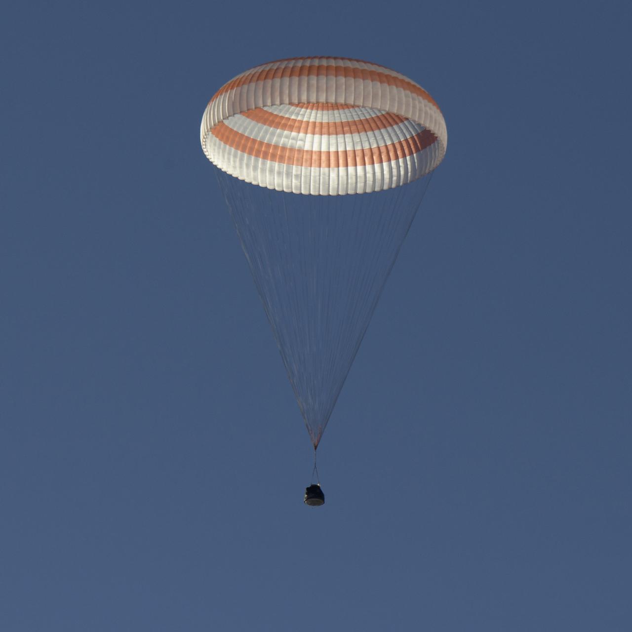 The Soyuz MS-08 spacecraft is seen as it lands with Expedition 56 Commander Drew Feustel and Flight Engineer Ricky Arnold of NASA, along with Flight Engineer and Soyuz Commander Oleg Artemyev of Roscosmos near the town of Zhezkazgan, Kazakhstan on Thursday, Oct. 4, 2018. Feustel, Arnold, and Artemyev are returning after 197 days in space where they served as members of the Expedition 55 and 56 crews onboard the International Space Station. Photo Credit: (NASA/Bill Ingalls)