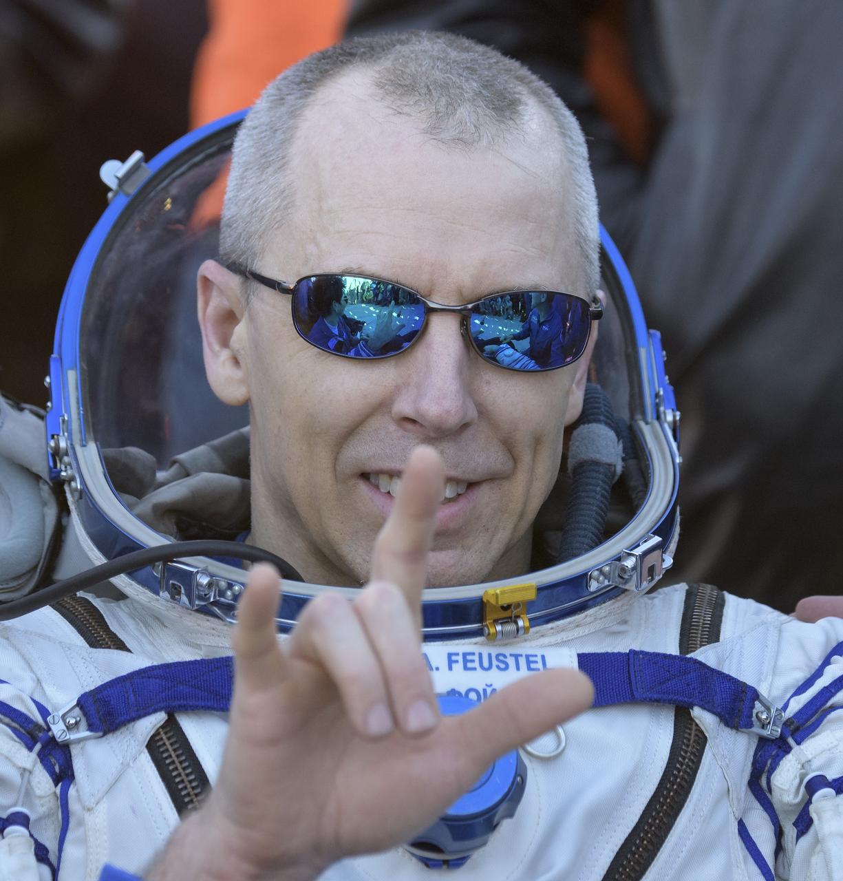 Expedition 56 Commander Drew Feustel of NASA rests in a chair just minutes after he and Expedition 56 Flight Engineer Ricky Arnold of NASA, and Expedition 56 Flight Engineer and Soyuz Commander Oleg Artemyev of Roscosmos landed in a remote area near the town of Zhezkazgan, Kazakhstan on Thursday, Oct. 4, 2018. Feustel, Arnold, and Artemyev are returning after 197 days in space where they served as members of the Expedition 55 and 56 crews onboard the International Space Station. Photo Credit: (NASA/Bill Ingalls)