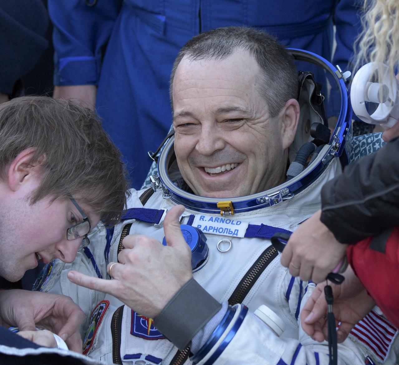 Expedition 56 Flight Engineer Ricky Arnold of NASA rests in a chair just minutes after he and Expedition 56 Commander Drew Feustel of NASA, and Expedition 56 Flight Engineer and Soyuz Commander Oleg Artemyev of Roscosmos landed in a remote area near the town of Zhezkazgan, Kazakhstan on Thursday, Oct. 4, 2018. Feustel, Arnold, and Artemyev are returning after 197 days in space where they served as members of the Expedition 55 and 56 crews onboard the International Space Station. Photo Credit: (NASA/Bill Ingalls)