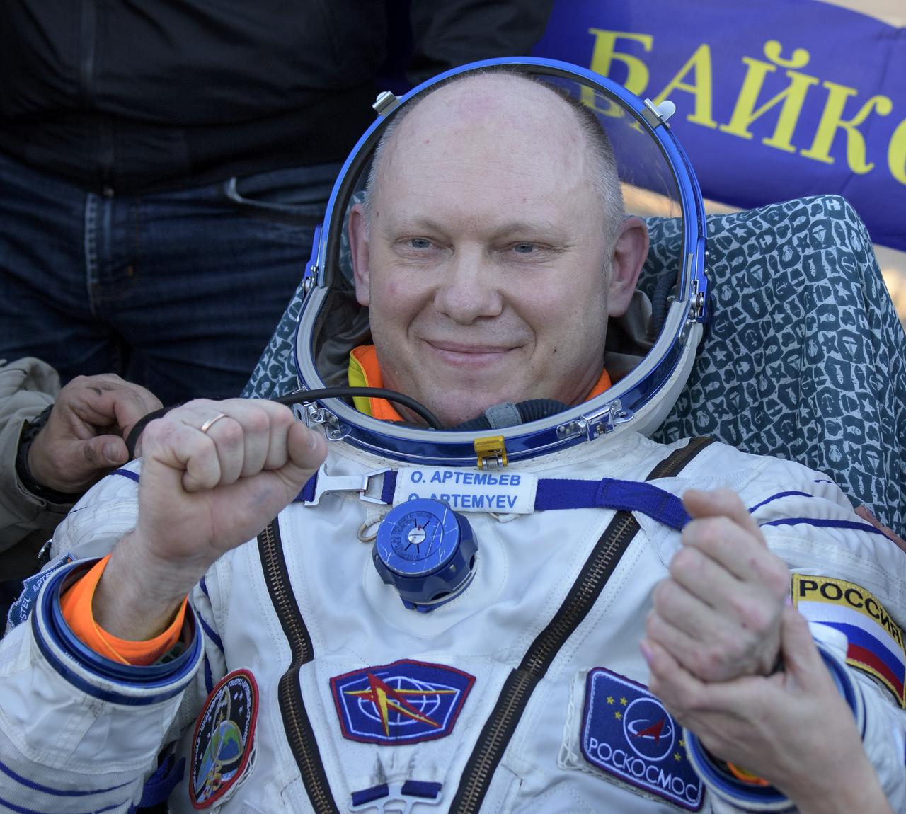Expedition 56 Flight Engineer and Soyuz Commander Oleg Artemyev of Roscosmos rests in a chair just minutes after he and Expedition 56 Flight Engineer Ricky Arnold of NASA, and Expedition 56 Commander Drew Feustel of NASA landed in a remote area near the town of Zhezkazgan, Kazakhstan on Thursday, Oct. 4, 2018. Feustel, Arnold, and Artemyev are returning after 197 days in space where they served as members of the Expedition 55 and 56 crews onboard the International Space Station. Photo Credit: (NASA/Bill Ingalls)