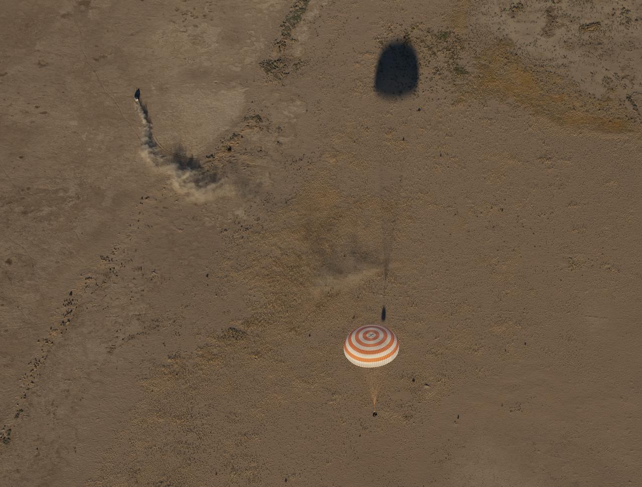 The Soyuz MS-08 spacecraft is seen as it lands with Expedition 56 Commander Drew Feustel and Flight Engineer Ricky Arnold of NASA, along with Flight Engineer and Soyuz Commander Oleg Artemyev of Roscosmos near the town of Zhezkazgan, Kazakhstan on Thursday, Oct. 4, 2018. Feustel, Arnold, and Artemyev are returning after 197 days in space where they served as members of the Expedition 55 and 56 crews onboard the International Space Station. Photo Credit: (NASA/Bill Ingalls)