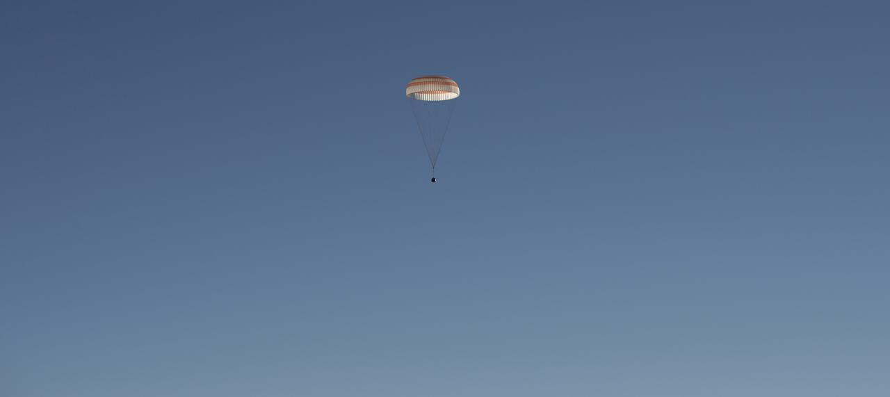 The Soyuz MS-08 spacecraft is seen as it lands with Expedition 56 Commander Drew Feustel and Flight Engineer Ricky Arnold of NASA, along with Flight Engineer and Soyuz Commander Oleg Artemyev of Roscosmos near the town of Zhezkazgan, Kazakhstan on Thursday, Oct. 4, 2018. Feustel, Arnold, and Artemyev are returning after 197 days in space where they served as members of the Expedition 55 and 56 crews onboard the International Space Station. Photo Credit: (NASA/Bill Ingalls)