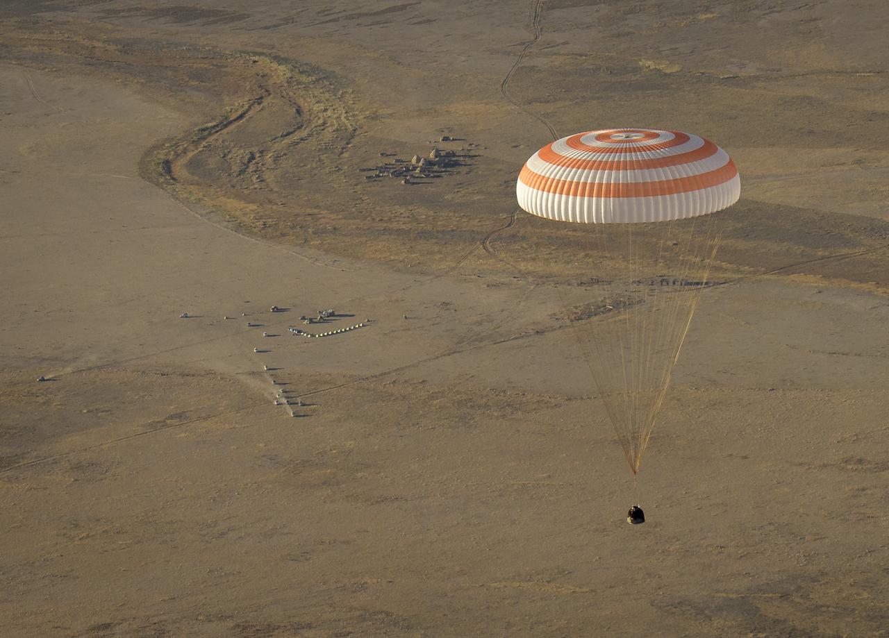 The Soyuz MS-08 spacecraft is seen as it lands with Expedition 56 Commander Drew Feustel and Flight Engineer Ricky Arnold of NASA, along with Flight Engineer and Soyuz Commander Oleg Artemyev of Roscosmos near the town of Zhezkazgan, Kazakhstan on Thursday, Oct. 4, 2018. Feustel, Arnold, and Artemyev are returning after 197 days in space where they served as members of the Expedition 55 and 56 crews onboard the International Space Station. Photo Credit: (NASA/Bill Ingalls)