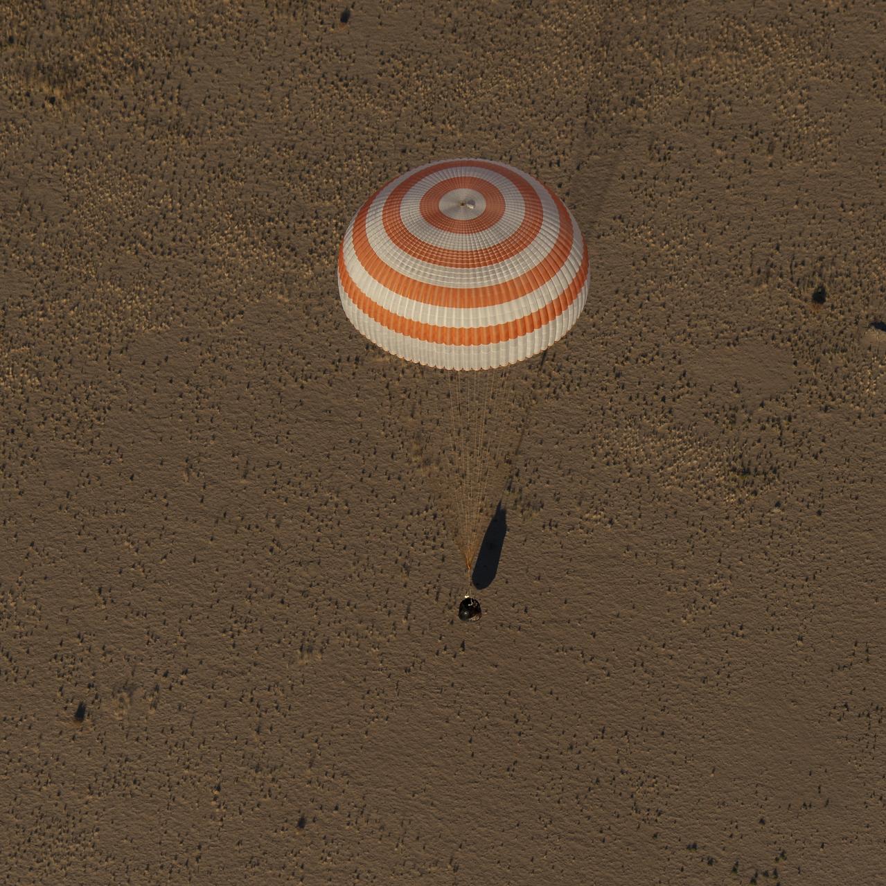 The Soyuz MS-08 spacecraft is seen as it lands with Expedition 56 Commander Drew Feustel and Flight Engineer Ricky Arnold of NASA, along with Flight Engineer and Soyuz Commander Oleg Artemyev of Roscosmos near the town of Zhezkazgan, Kazakhstan on Thursday, Oct. 4, 2018. Feustel, Arnold, and Artemyev are returning after 197 days in space where they served as members of the Expedition 55 and 56 crews onboard the International Space Station. Photo Credit: (NASA/Bill Ingalls)