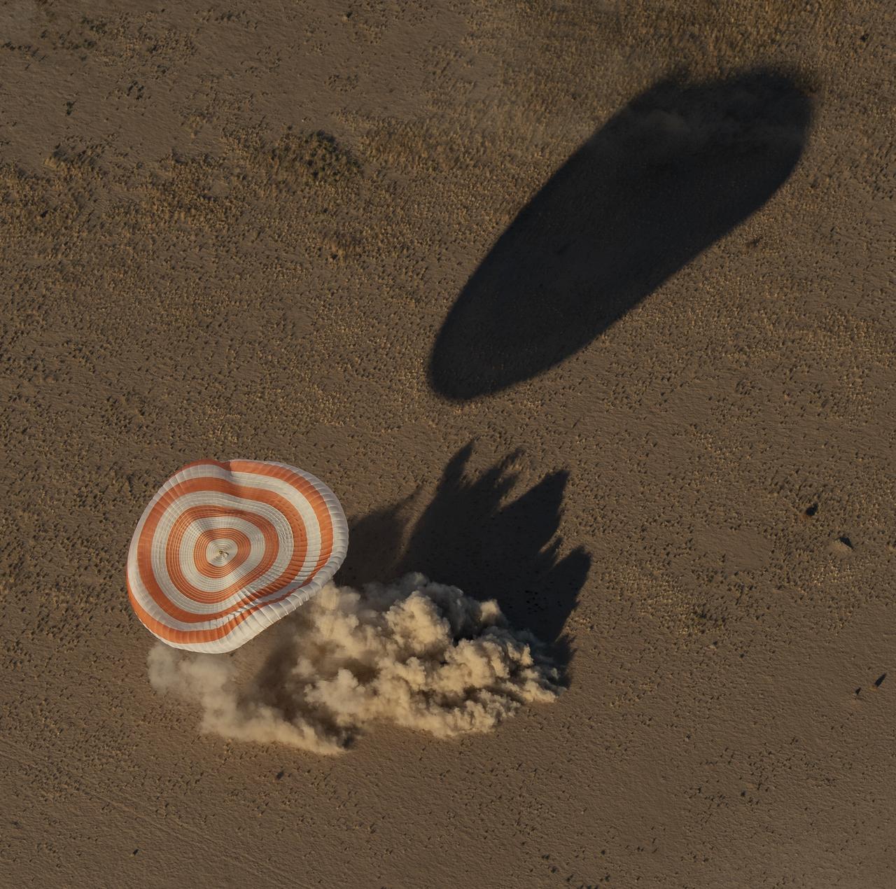 The Soyuz MS-08 spacecraft is seen as it lands with Expedition 56 Commander Drew Feustel and Flight Engineer Ricky Arnold of NASA, along with Flight Engineer and Soyuz Commander Oleg Artemyev of Roscosmos near the town of Zhezkazgan, Kazakhstan on Thursday, Oct. 4, 2018. Feustel, Arnold, and Artemyev are returning after 197 days in space where they served as members of the Expedition 55 and 56 crews onboard the International Space Station. Photo Credit: (NASA/Bill Ingalls)