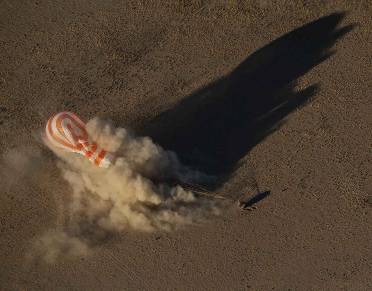 The Soyuz MS-08 spacecraft is seen as it lands with Expedition 56 Commander Drew Feustel and Flight Engineer Ricky Arnold of NASA, along with Flight Engineer and Soyuz Commander Oleg Artemyev of Roscosmos near the town of Zhezkazgan, Kazakhstan on Thursday, Oct. 4, 2018. Feustel, Arnold, and Artemyev are returning after 197 days in space where they served as members of the Expedition 55 and 56 crews onboard the International Space Station. Photo Credit: (NASA/Bill Ingalls)