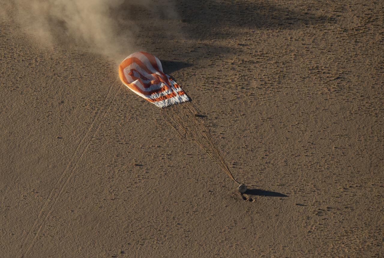The Soyuz MS-08 spacecraft is seen as it lands with Expedition 56 Commander Drew Feustel and Flight Engineer Ricky Arnold of NASA, along with Flight Engineer and Soyuz Commander Oleg Artemyev of Roscosmos near the town of Zhezkazgan, Kazakhstan on Thursday, Oct. 4, 2018. Feustel, Arnold, and Artemyev are returning after 197 days in space where they served as members of the Expedition 55 and 56 crews onboard the International Space Station. Photo Credit: (NASA/Bill Ingalls)